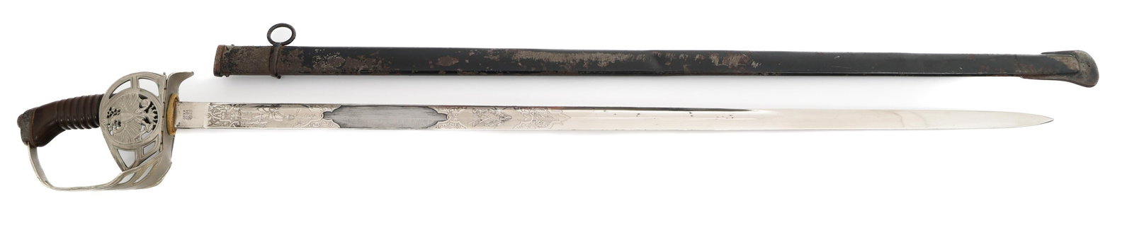 IMPERIAL GERMAN PRUSSIAN M1889 CAVALRY SWORD: IMPERIAL GERMAN PRUSSIAN M1889 CAVALRY SWORD Imperial German Prussian M1889 Cavalry Officer Sword. Single edged, bright blade with fuller. Triple acid etched with cavalry and floral designs. Maker mar