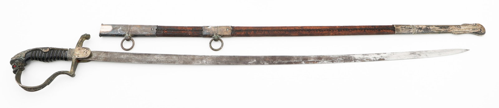 WWI GERMAN FIREMAN OFFICER LION HEAD DRESS SWORD: WWI GERMAN FIREMAN OFFICER LION HEAD DRESS SWORD WWI Imperial German Fireman Officer Lion Head Presentation Sword. Single edged, slightly curved blade with fuller. Double acid etched with dedication (