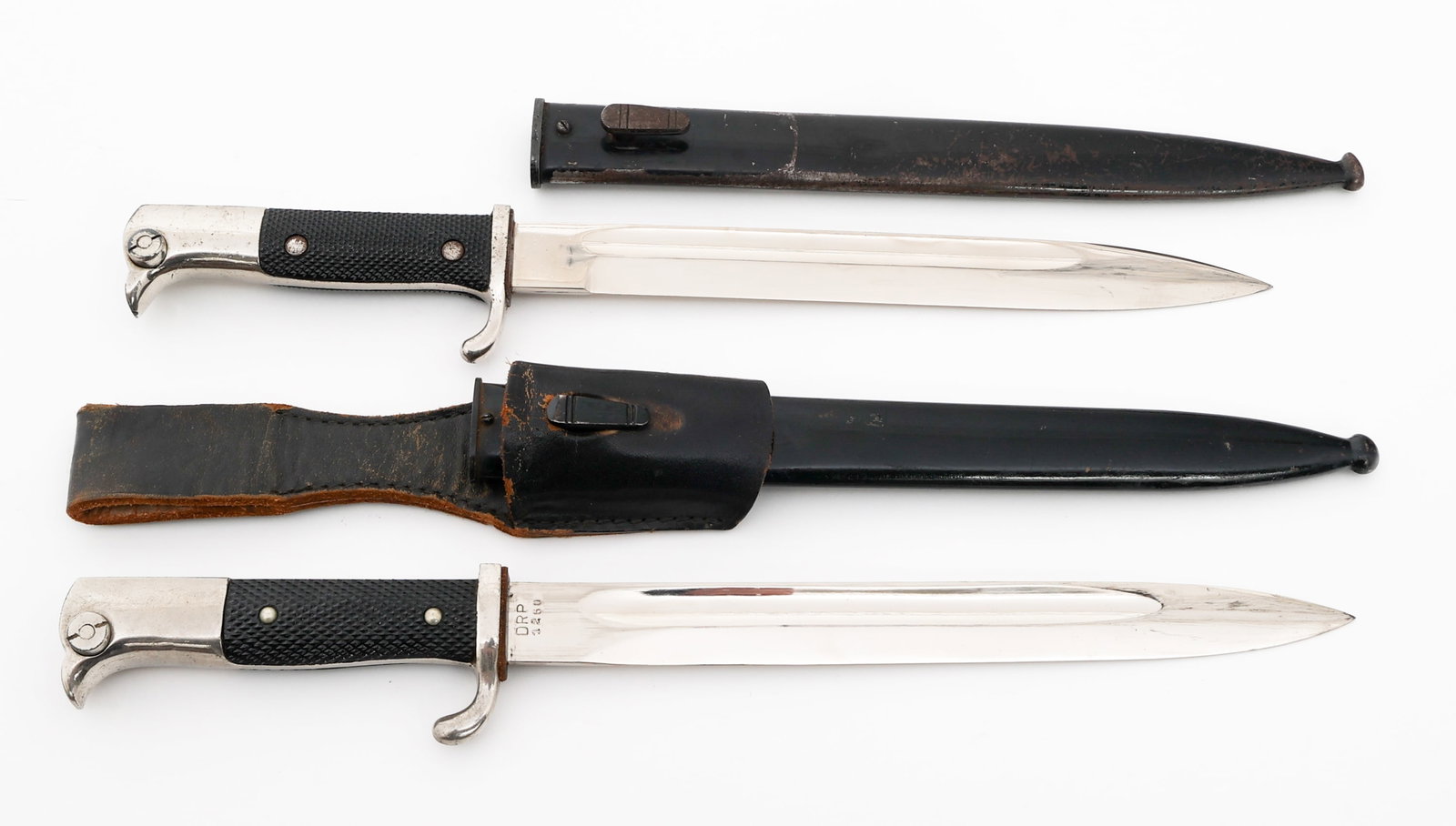 WWII GERMAN DRP POSTSCHUTZ & K98 DRESS BAYONETS: WWII GERMAN DRP POSTSCHUTZ & K98 DRESS BAYONETS WWII German DRP Postschutz & Standard K98 Dress Bayonets. (1) DRP Postschutz K98 Dress Bayonet. Single edged, bright blade with fuller. Maker marked by 