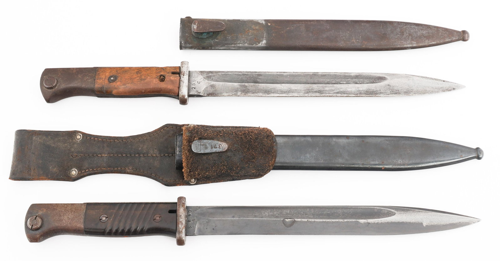 WWII GERMAN K98 COMBAT BAYONETS: WWII GERMAN K98 COMBAT BAYONETS WWII German K98 Combat Bayonets. (1) Combat K98. Single edged, blued blade with fuller. Maker marked by Mundlos on the ricasso. Stamped 40 on the spine. Steel hilt with