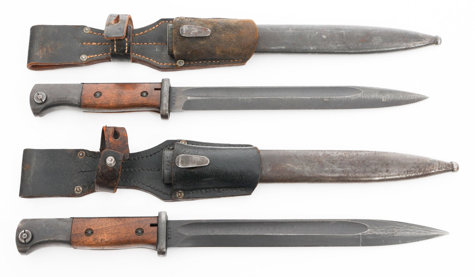 WWII GERMAN K98 COMBAT BAYONETS: WWII GERMAN K98 COMBAT BAYONETS WWII German K98 Combat Bayonets. Single edged, blued blades with fuller. One is maker marked by Carl Eickhorn and the other by Staatliche Waffenfabrik Chatellerault, bo