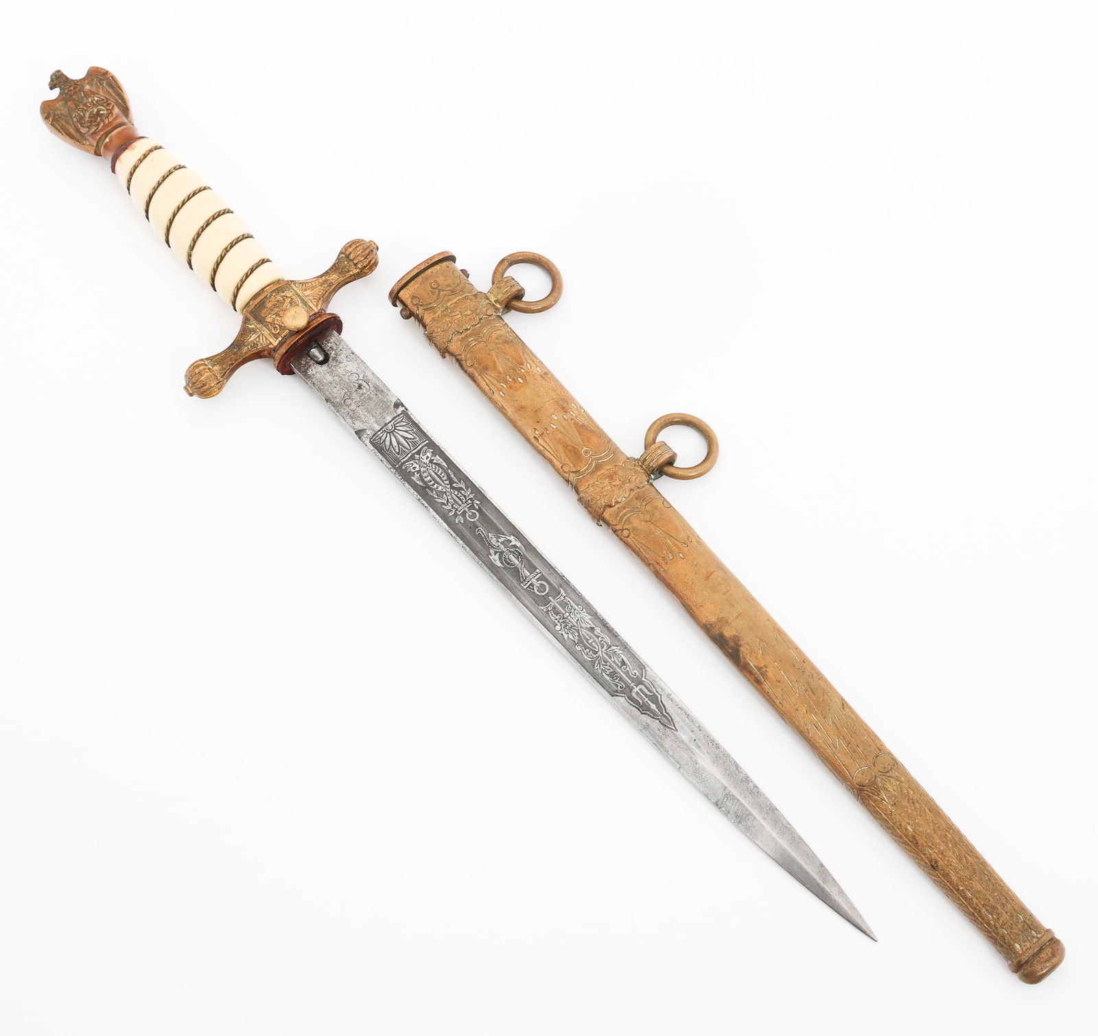 WWII GERMAN KRIEGSMARINE DRESS DAGGER by EICKHORN: WWII GERMAN KRIEGSMARINE DRESS DAGGER by EICKHORN WWII German Kriegsmarine 2nd Model Officer Dress Dagger. Double edged blade with dual fuller. Acid etched with Naval and floral designs. Maker mark by