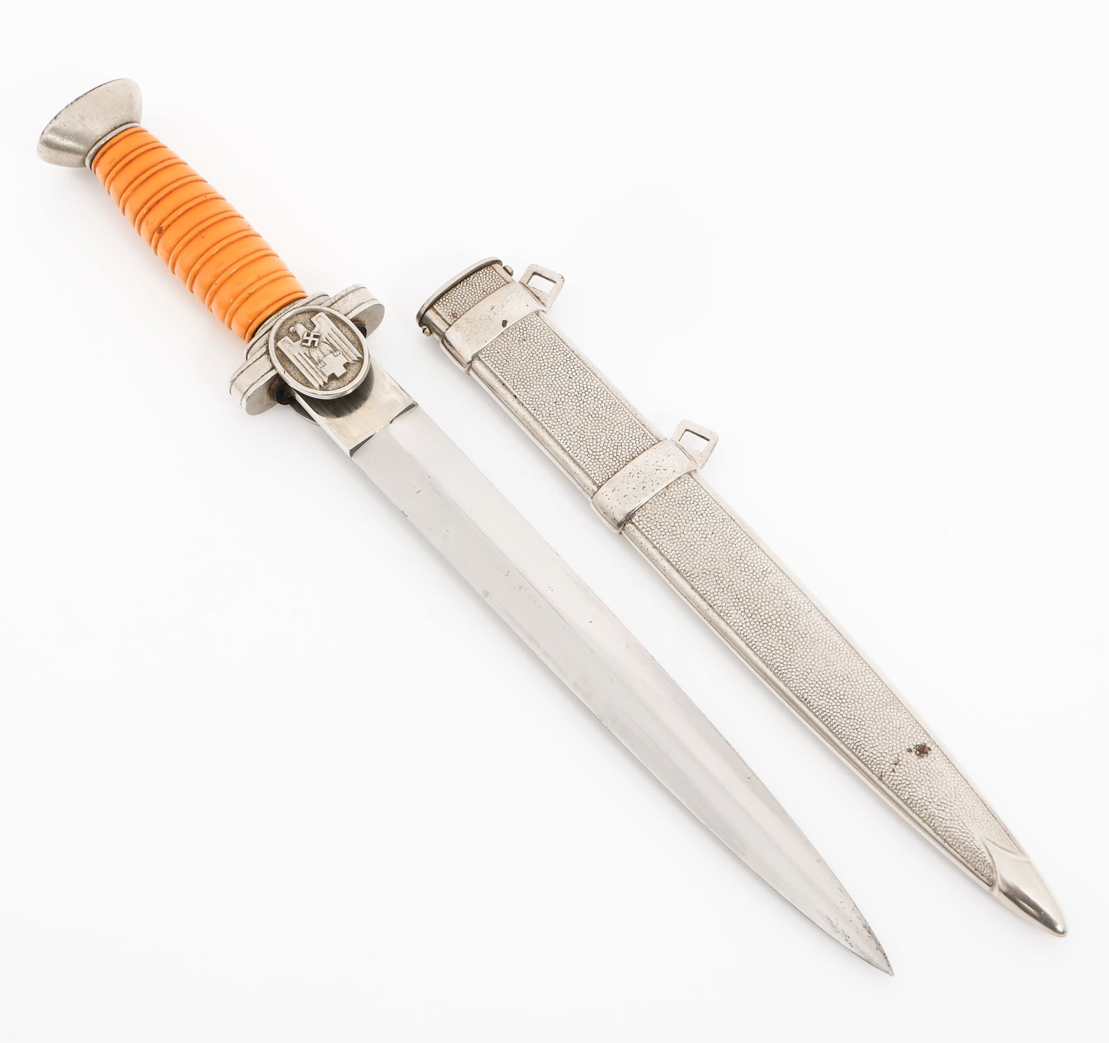 WWII GERMAN RED CROSS LEADERS DAGGER: WWII GERMAN RED CROSS LEADERS DAGGER WWII German Red Cross Leader's Dagger. Double edged, bright blade with no visible marks or stamps. Leather buffer pad present. Nickel-silver hilt with orange cellu