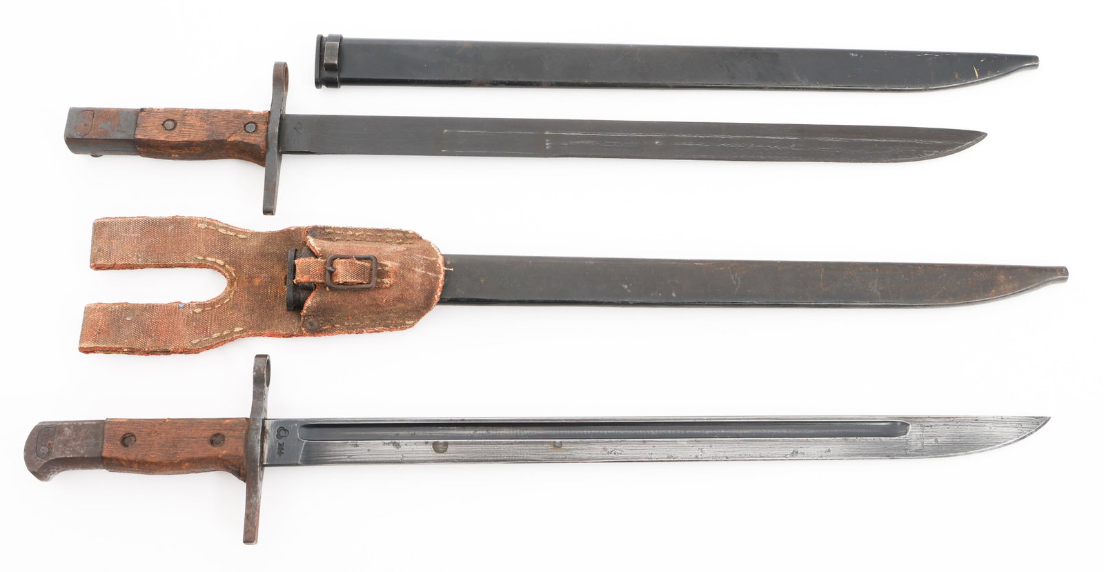 WWII IMPERIAL JAPANESE LATE WAR TYPE 30 BAYONETS: WWII IMPERIAL JAPANESE LATE WAR TYPE 30 BAYONETS WWII Imperial Japanese Late War Type 30 Bayonets. (1) Single edged, blued blade with maker mark of Toyoda Automatic Loom Works stamped on the ricasso. 