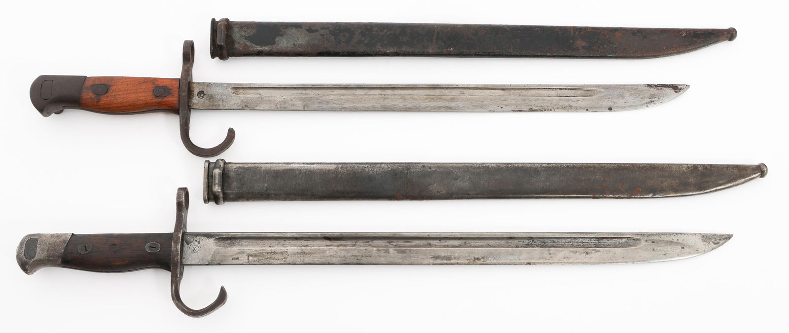 WWII IMPERIAL JAPANESE TYPE 30 BAYONETS: WWII IMPERIAL JAPANESE TYPE 30 BAYONETS WWII Imperial Japanese Type 30 Bayonets. (1) Single edged, bright blade with fuller. Maker mark of Tokyo Army Ministry Armory stamped on the ricasso. Steel hilt