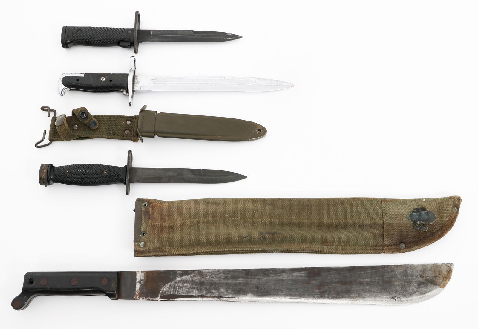 WWII - COLD WAR US M1, M4, M5 BAYONETS & MACHETE: WWII - COLD WAR US M1, M4, M5 BAYONETS & MACHETE WWII - Cold War US Army M1, M4, M5 and M1942 Machete. (1) M1 Parade Bayonet. Chromed blade and hilt. Maker marked by UFH. No scabbard. (1) M4 Bayonet.