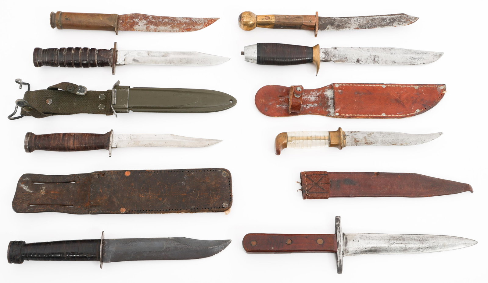 WWII - POST WAR THEATER MADE & COMMERCIAL KNIVES: WWII - POST WAR THEATER MADE & COMMERCIAL KNIVES WWII - Post War Theater Made and Commercial Knives. Makers include Kutmaster and Aerial. Majority have sheaths. Blade Length: 5 3/4" to 7 1/2" Total Le