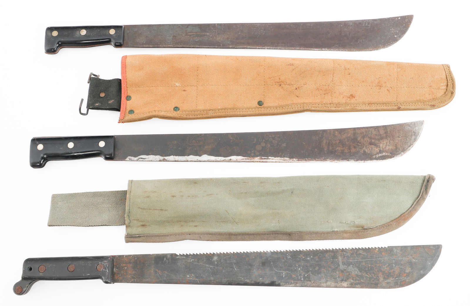 WWII US & BRITISH MADE M1942 MACHETES: WWII US & BRITISH MADE M1942 MACHETES WWII US and British Made M1942 Machetes. (2) British M1942 Machetes. Single edged, blued machete blades. Maker marked by Sheffield England. Composite grips. One h