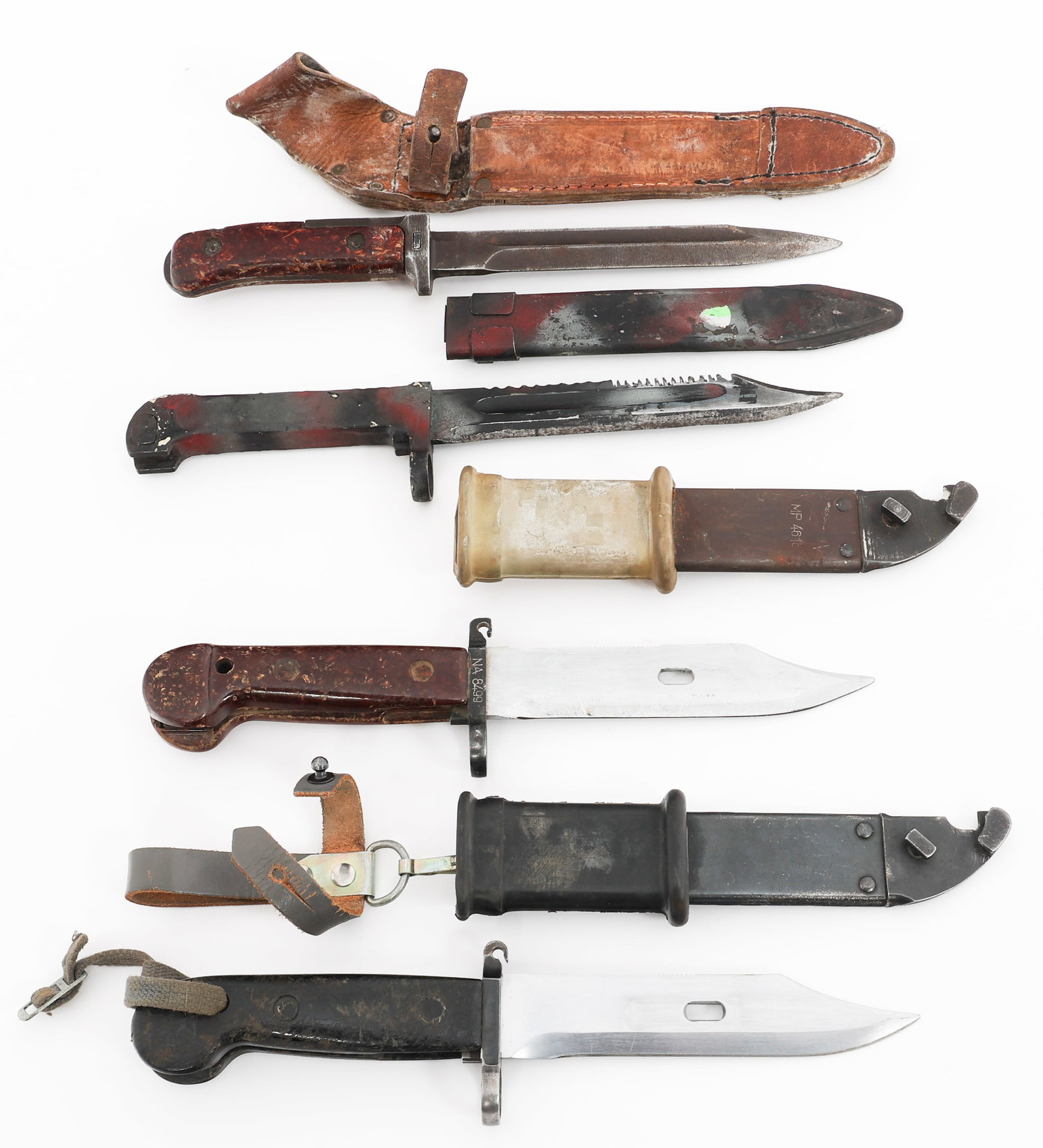 COLD WAR AKM & CZECH VZ-58 BAYONETS WITH SCABBARDS: COLD WAR AKM & CZECH VZ-58 BAYONETS WITH SCABBARDS Cold War AKM and Czech VZ-58 Bayonets. (2) AKM Type 1 Bayonets. Composite handles. Steel scabbards. One has leather frog. (1) AKM Transitional Bayone