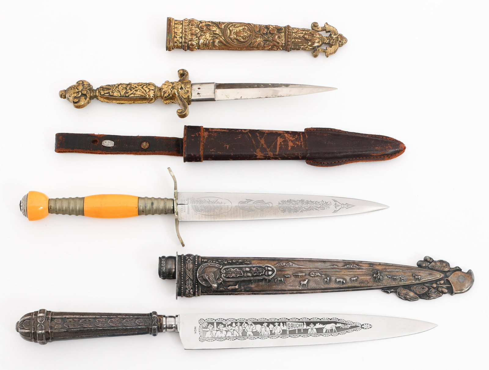 SWISS & GERMAN MADE CIVILIAN HUNTING KNIVES: SWISS & GERMAN MADE CIVILIAN HUNTING KNIVES Swiss & German Made Civilian Hunting Knives. (1) Inox Argentinian Gaucho Themed Hunting Knife. Maker marked near the hilt. Decorated alloy hilt and scabbard