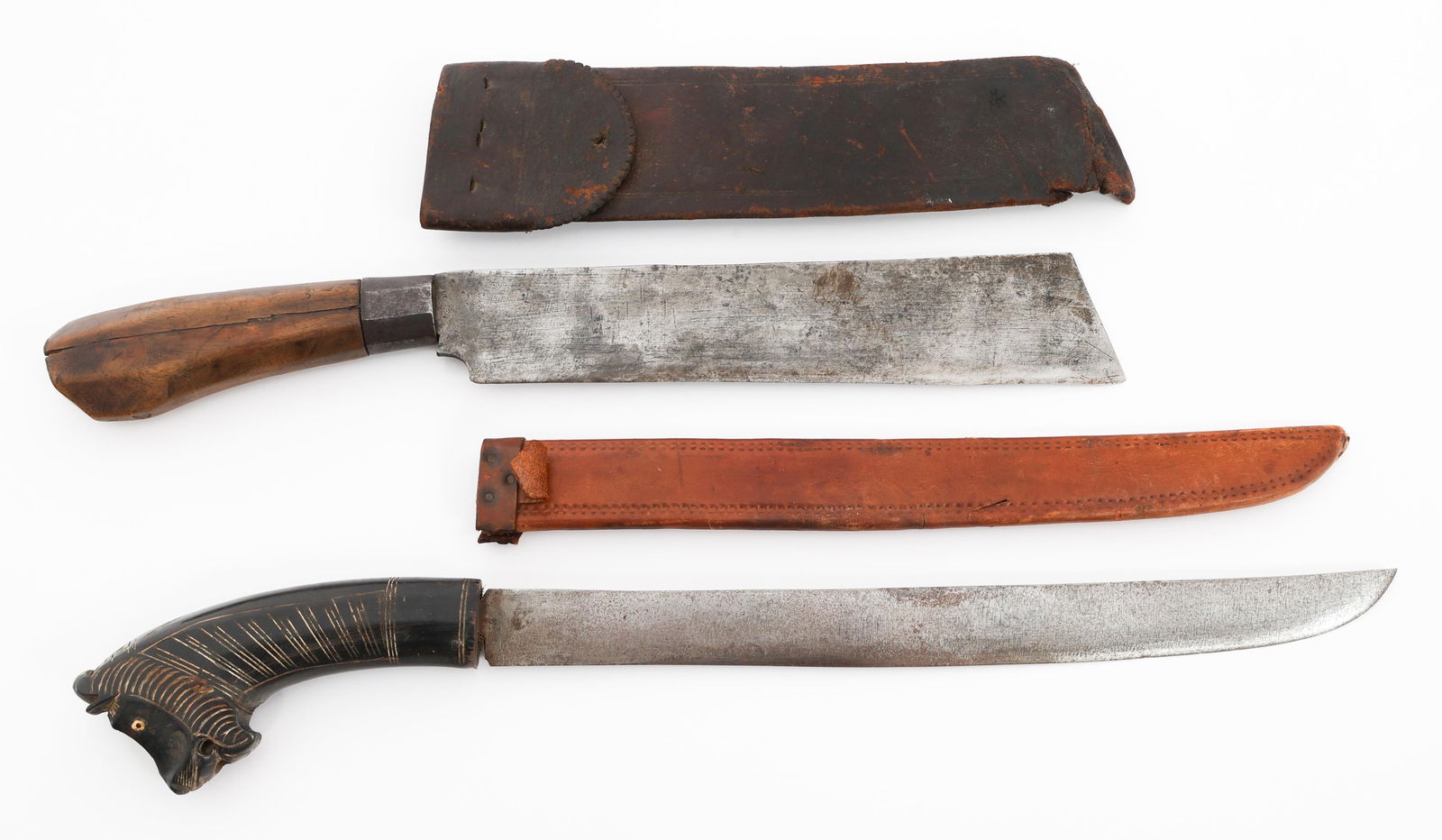 SOUTHEAST ASIAN GOLOK PARANG & PEDANG: SOUTHEAST ASIAN GOLOK PARANG & PEDANG Southeast Asian Golok Parang and Pedang. (1) Golok Parang. Single edged, machete blade. Wood handle. (1) Pedang. Single edged. Carved wooden handle. Leather sheat