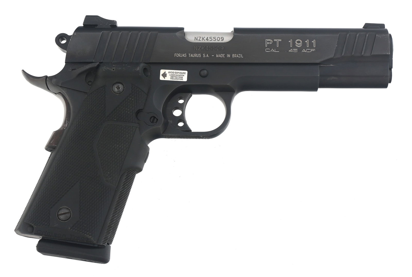 TAURUS MODEL PT 1911 .45 ACP SEMI AUTO PISTOL: TAURUS MODEL PT 1911 .45 ACP SEMI AUTO PISTOL Taurus Model PT 1911 Homeland Defender .45 ACP caliber semi automatic pistol. Two dot sights. Crimson Trace laser grips. Two magazines. Original Taurus ha