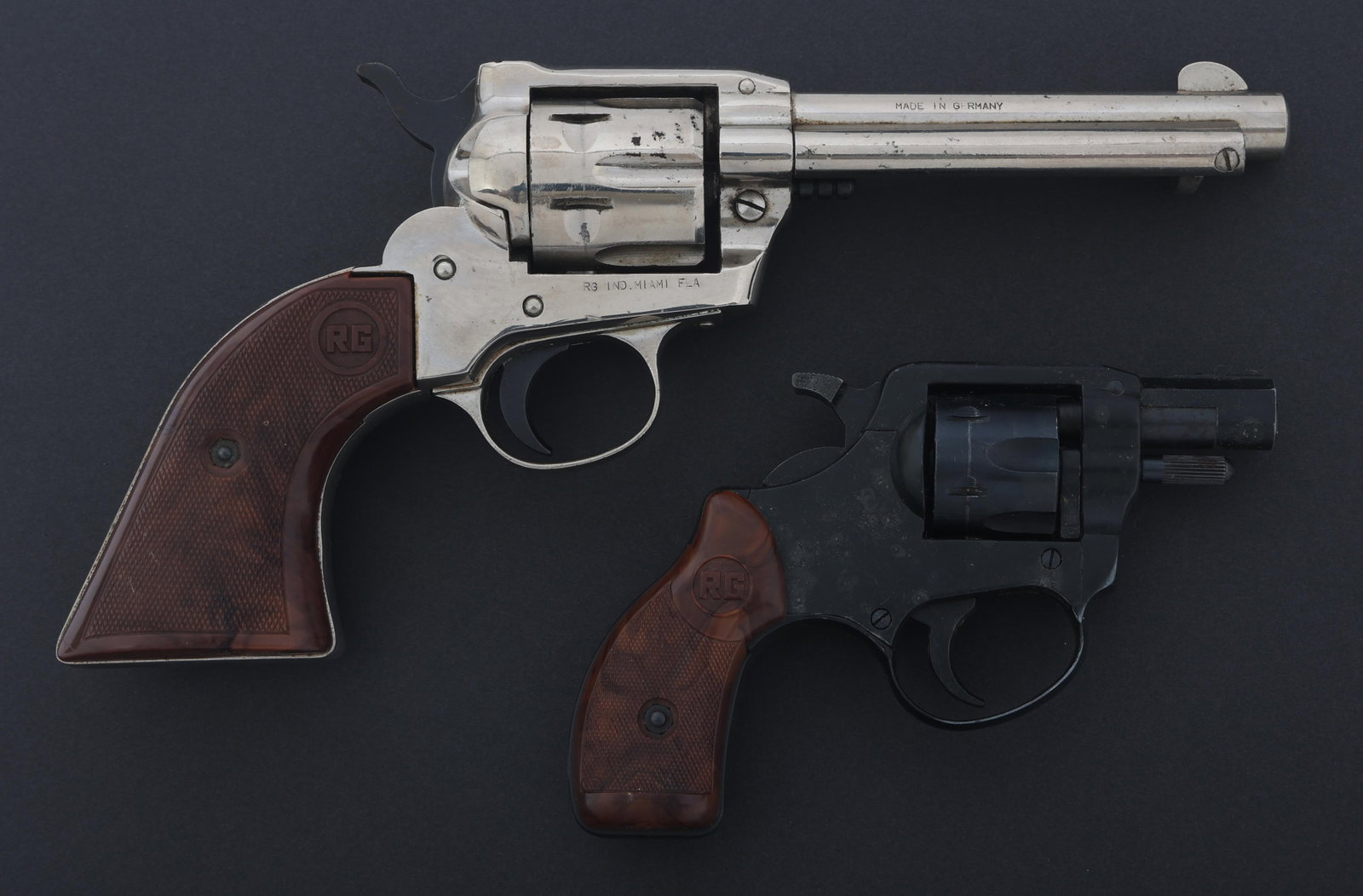 ROHM MODEL 66 & RG-14 .22 LR CALIBER REVOLVERS: ROHM MODEL 66 & RG-14 .22 LR CALIBER REVOLVERS Rohm .22 caliber revolvers. A) Rohm Model 66 .22 LR caliber SA revolver. RG Ind import. Six shot fluted cylinder. Checkered composite grips. Fixed sights