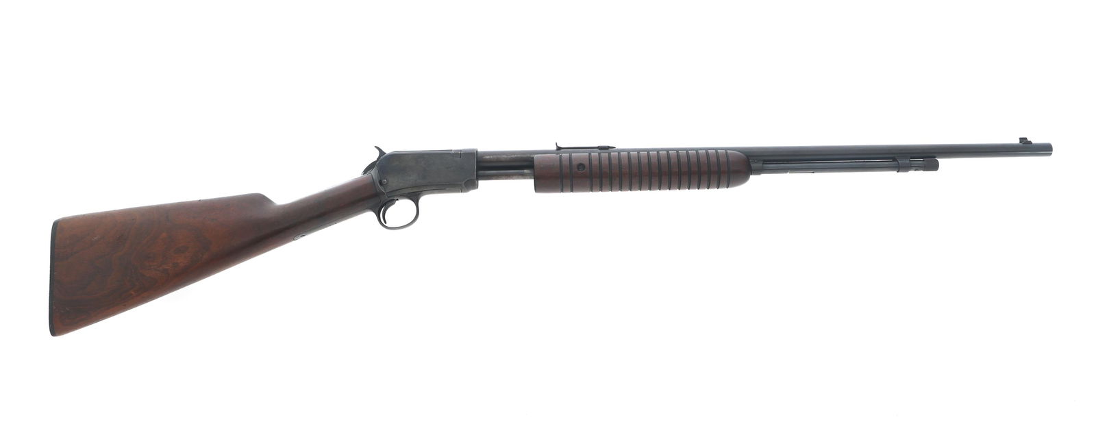 WINCHESTER MODEL 62 .22 S-L-LR CALIBER RIFLE: WINCHESTER MODEL 62 .22 S-L-LR CALIBER RIFLE 1946 Winchester Model 62 .22 S-L-LR caliber pump action rifle. Blued finish. Blade front sight. Adjustable rear sight. Wood stocks. Caliber / Gauge: 22 S-L