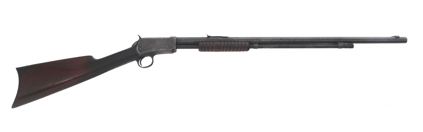 WINCHESTER MODEL 1890 .22 SHORT PUMP ACTION RIFLE: WINCHESTER MODEL 1890 .22 SHORT PUMP ACTION RIFLE 1905 Winchester Model 1890 .22 short pump action take down rifle. Blade front sight. Adjustable rear sight. Checkered wood stock. Metal butt plate. Ca