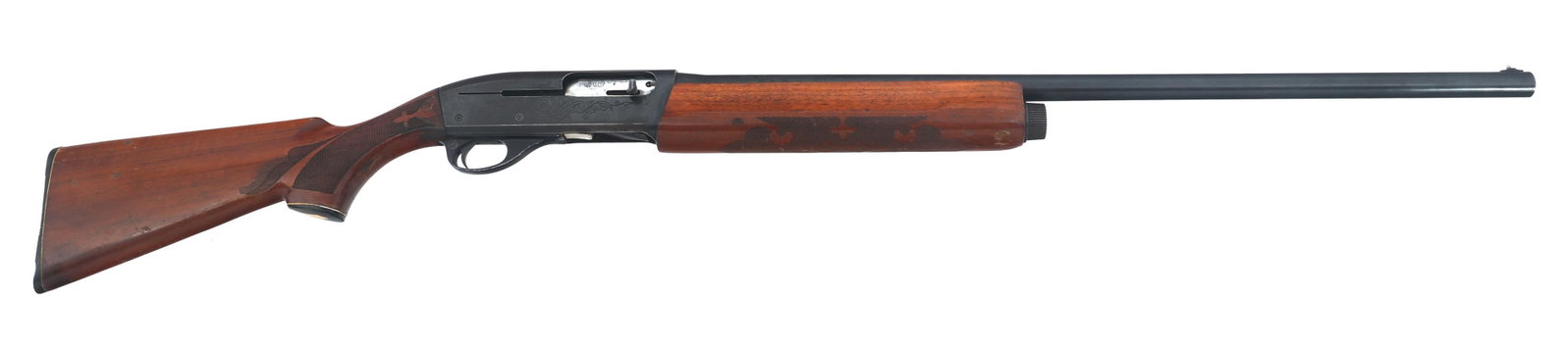 REMINGTON MODEL 1100 12 GAUGE SHOTGUN: REMINGTON MODEL 1100 12 GAUGE SHOTGUN Remington Model 1100 12 gauge semi-automatic shotgun. 2 3/4 inch chamber. Modified choke. Engraved receiver. Checkered wood stock and forend. Wood butt plate. Bea