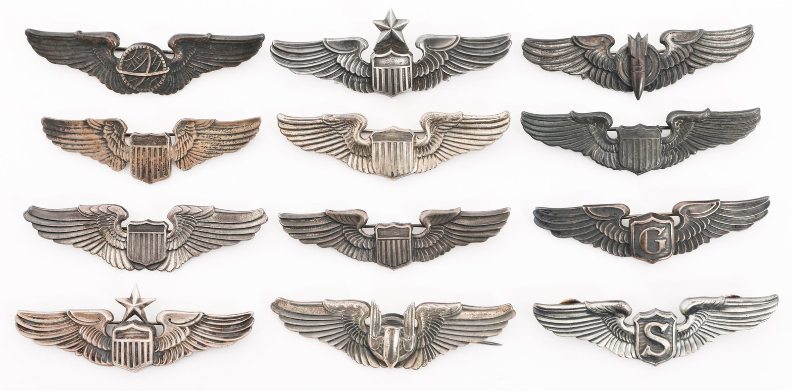 WWII USAAF 3" QUALIFICATION WINGS: WWII USAAF 3" QUALIFICATION WINGS WWII USAAF 3" Qualification Wings. Includes Senior Pilot, Pilot, Service Pilot, Glider Pilot, Bombardier, Aerial Gunner, and Navigator wings. Pin back and clutch back