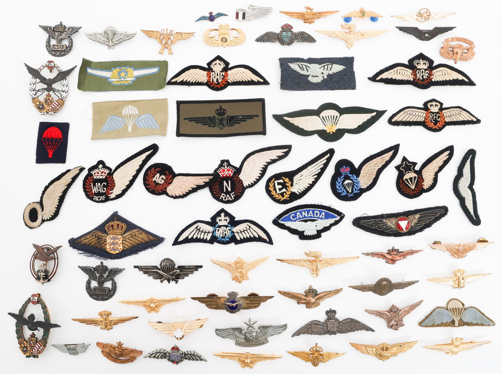 WWII - CURRENT WORLD MILITARY WINGS, BADGES & PINS: WWII - CURRENT WORLD MILITARY WINGS, BADGES & PINS WWII - Modern World Military Wings, Badges and Pins. Austrian Post War Restrike Pilot's Badge, UK, Canadian, Australian, Finnish Wings and more.