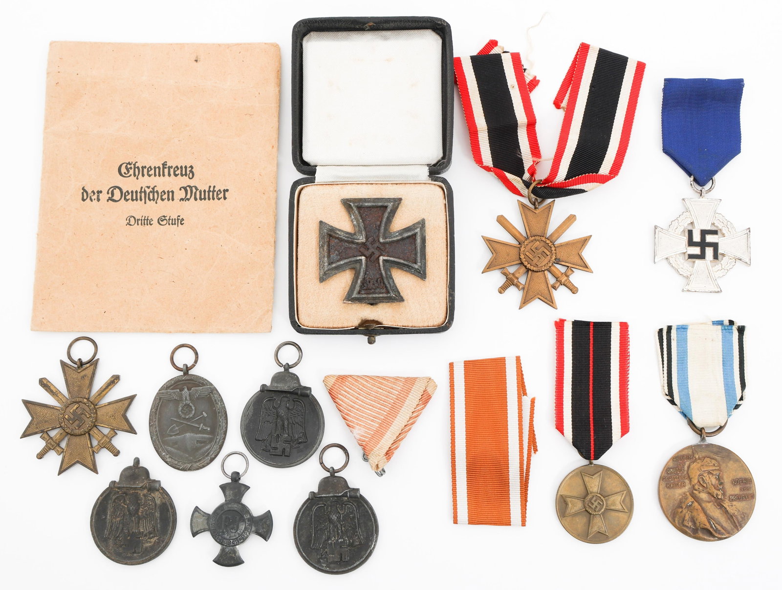 IMPERIAL GERMAN - WWII IRON CROSS & MEDALS: IMPERIAL GERMAN - WWII IRON CROSS & MEDALS Imperial German - WWII Iron Cross and Medals. (1) Iron Cross 1st Class with award case. "1" stamped on the leg. Medals include Kaiser Wilhelm Memorial Medal,