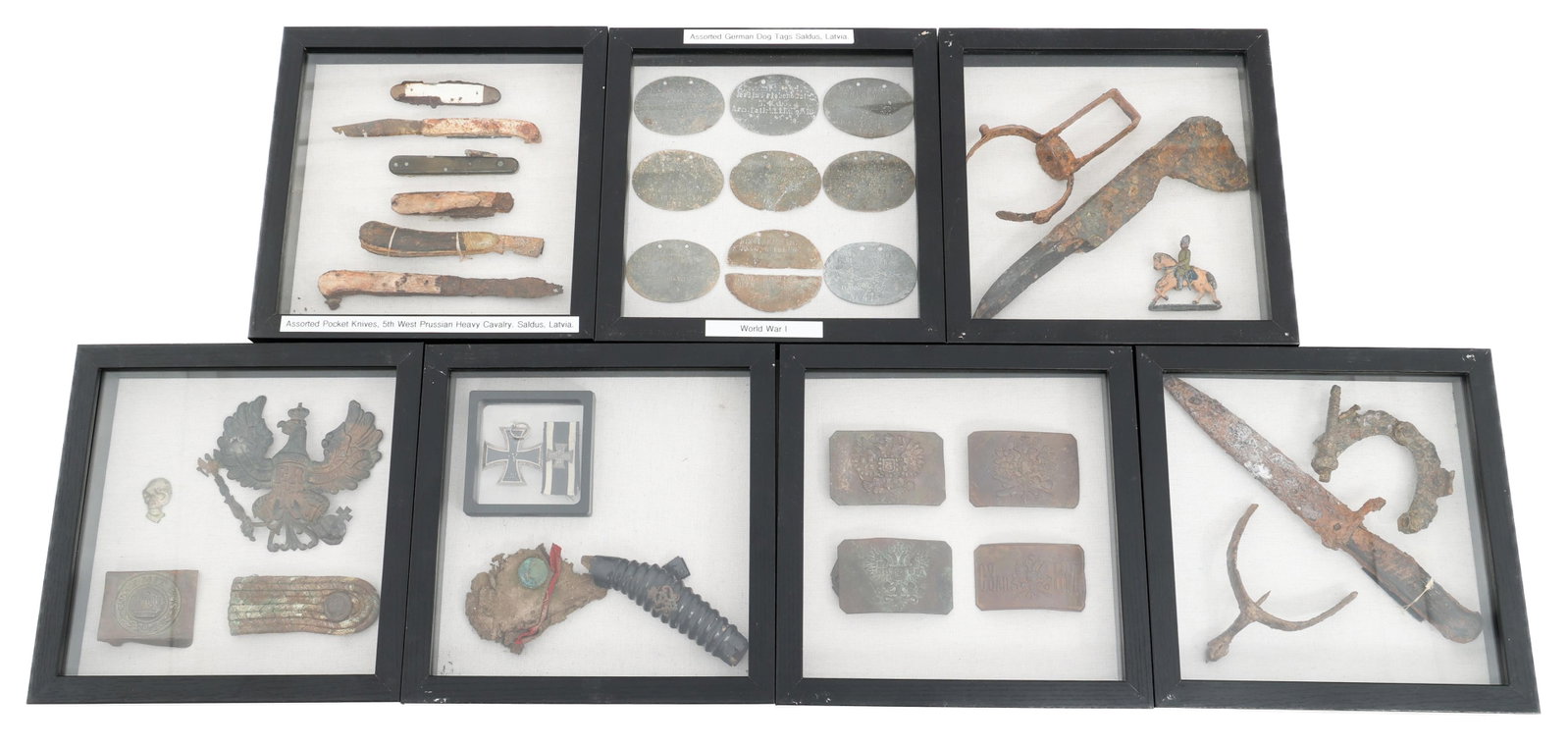 WWI IMPERIAL GERMAN & RUSSIAN DUG RELICS: WWI IMPERIAL GERMAN & RUSSIAN DUG RELICS WWI Imperial German & Russian Dug Relics. Includes belt buckles, trench knife, dog tags, pocket knives, Iron Cross, cavalry spurs, and more. Provenance: Estate