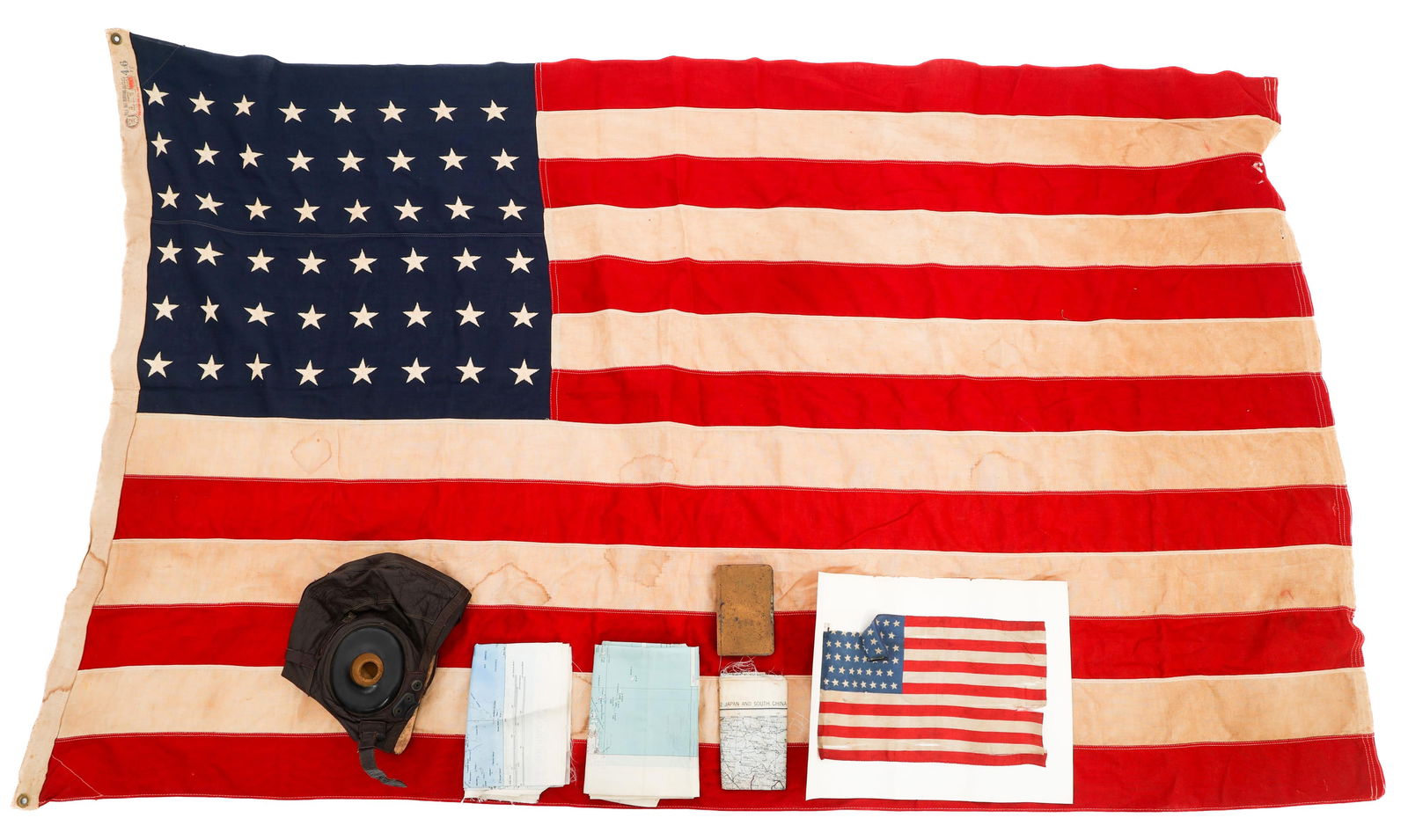 WWII USAAF TYPE A-11 HELMET, FLAGS & MAPS: WWII USAAF TYPE A-11 HELMET, FLAGS & MAPS WWII USAAF Type A-II Flight Helmet, 48 Star Flags and Escape and Evasion Maps. (1) Type A-11 Flight Helmet. Tag present. (2) 48 Star Flags. One cloth and one