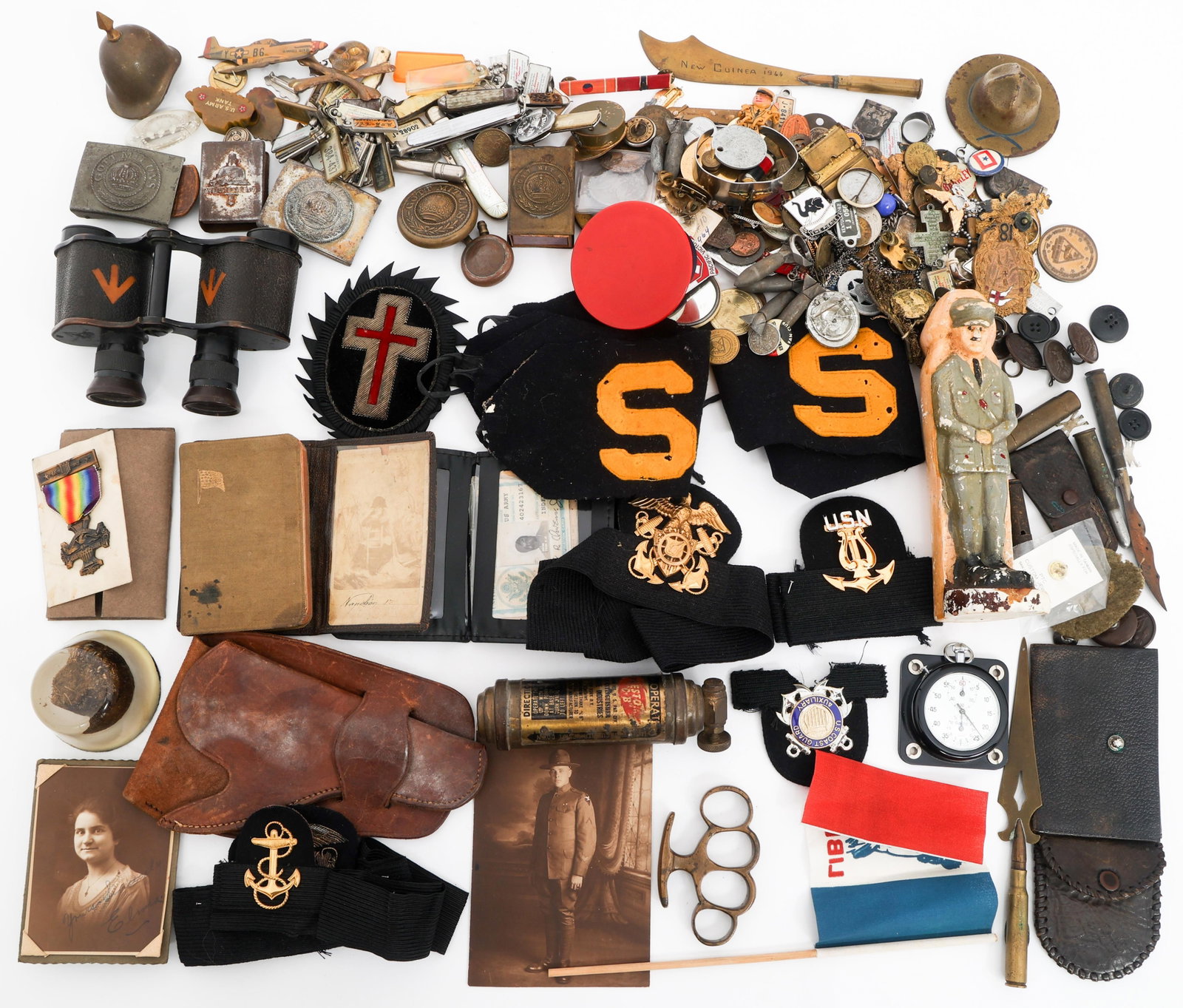 WWI - COLD WAR WORLD MILITARY BONANZA: WWI - COLD WAR WORLD MILITARY BONANZA WWI - Cold War World Military Bonanza. Includes Brass Knuckles, Prussian Army Belt Buckles, Binoculars, Hitler Statue, New Testament Bibles, Shell Casings, Insign
