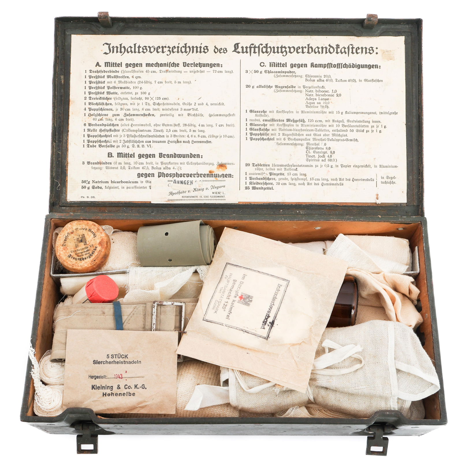 WWII GERMAN LUFTSCHUTZ VEHICLE FIRST AID KIT: WWII GERMAN LUFTSCHUTZ VEHICLE FIRST AID KIT WWII German Luftschutz Vehicle First Aid Kit. Contains bandages, sodium bicarb bottle, gauze and more. Not verified for completeness. Size: 8" x 14" x 5"