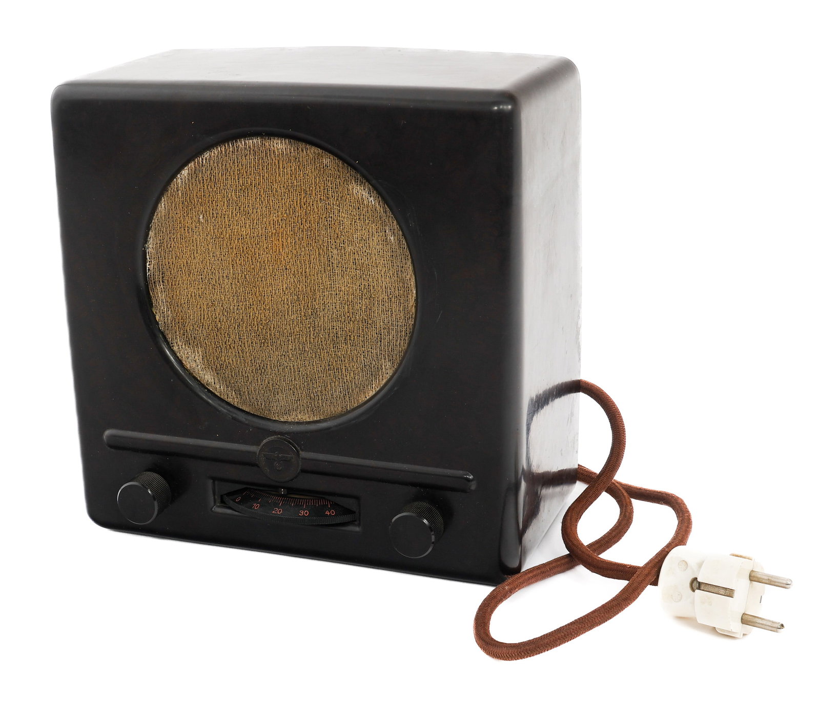 WWII GERMAN NSDAP DKE38 RADIO: WWII GERMAN NSDAP DKE38 RADIO WWII German NSDAP DKE38 Radio. Bakelite construction. Power cord is present. Size: 9 1/2" x 9 1/2" x 5" Provenance: Estate Militaria & Arms Collection of Dr. Steven D. Ni