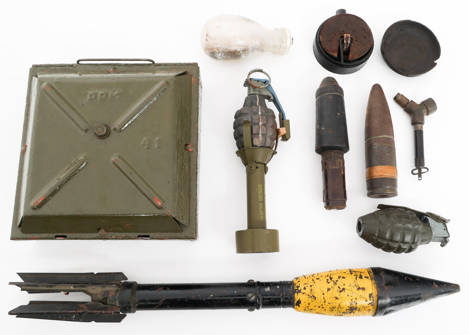 WWII - COLD WAR WORLD MILITARY ORDNANCE: WWII - COLD WAR WORLD MILITARY ORDNANCE WWII - Cold War World Military Ordnance. (1) German Glass Smoke Grenade. (1) Soviet TM-35 Anti-Tank Mine. (2) MkII Grenades. One with M1A2 adapter. (1) 40mm Bul