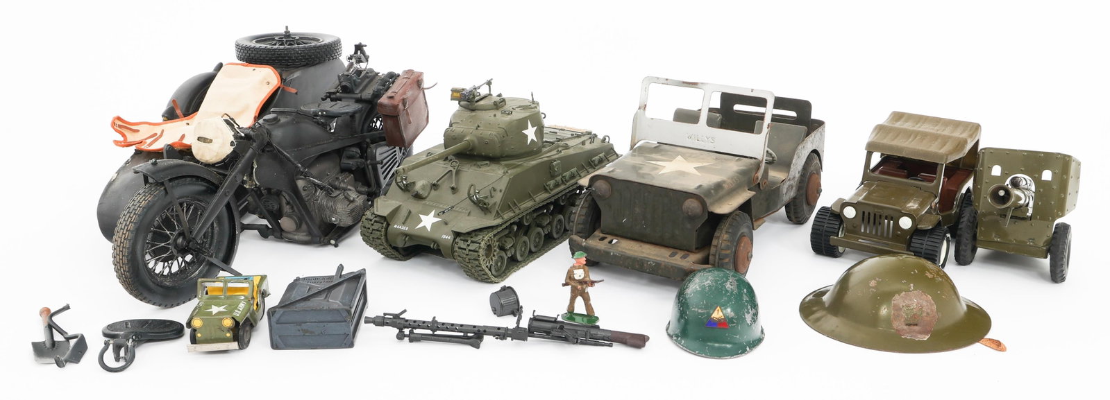 GERMAN & US ARMY WWII MILITARY TOYS & MODELS: GERMAN & US ARMY WWII MILITARY TOYS & MODELS German and US Army WWII Military Toys and Models. Includes US Army Willys Jeeps, German Motorcycle with sidecar, Sherman Tank, Field Artillery cannon and m