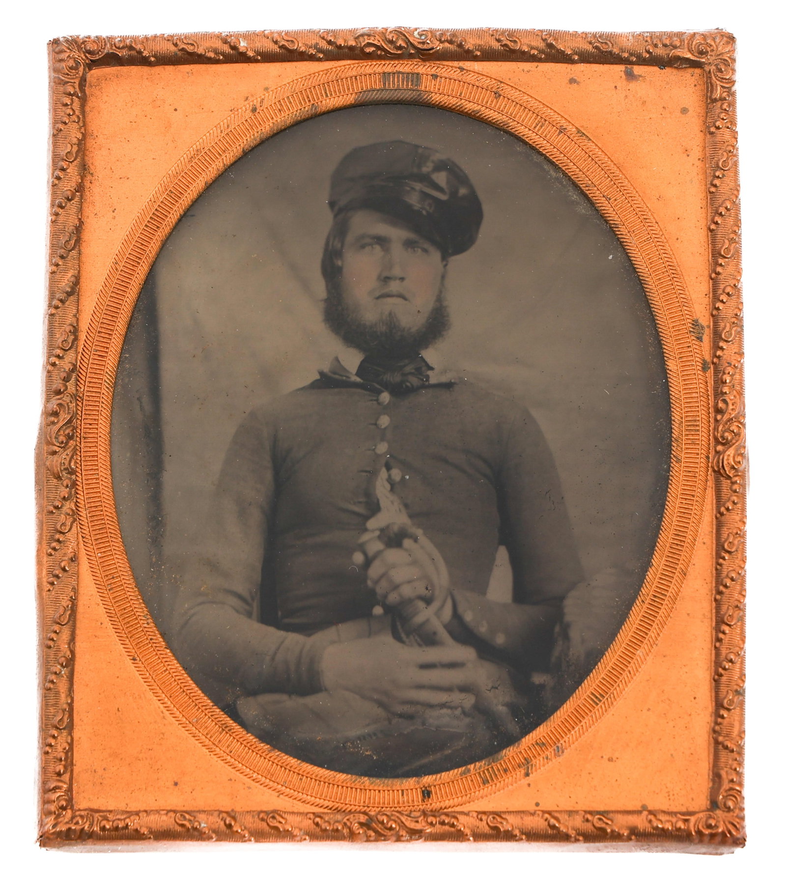 CIVIL WAR SOLDIER AMBROTYPE PHOTOGRAPH: CIVIL WAR SOLDIER AMBROTYPE PHOTOGRAPH Civil War Soldier Ambrotype Photograph. Sitting solider clutching a sword. Size: 3 1/4" x 2 1/4"