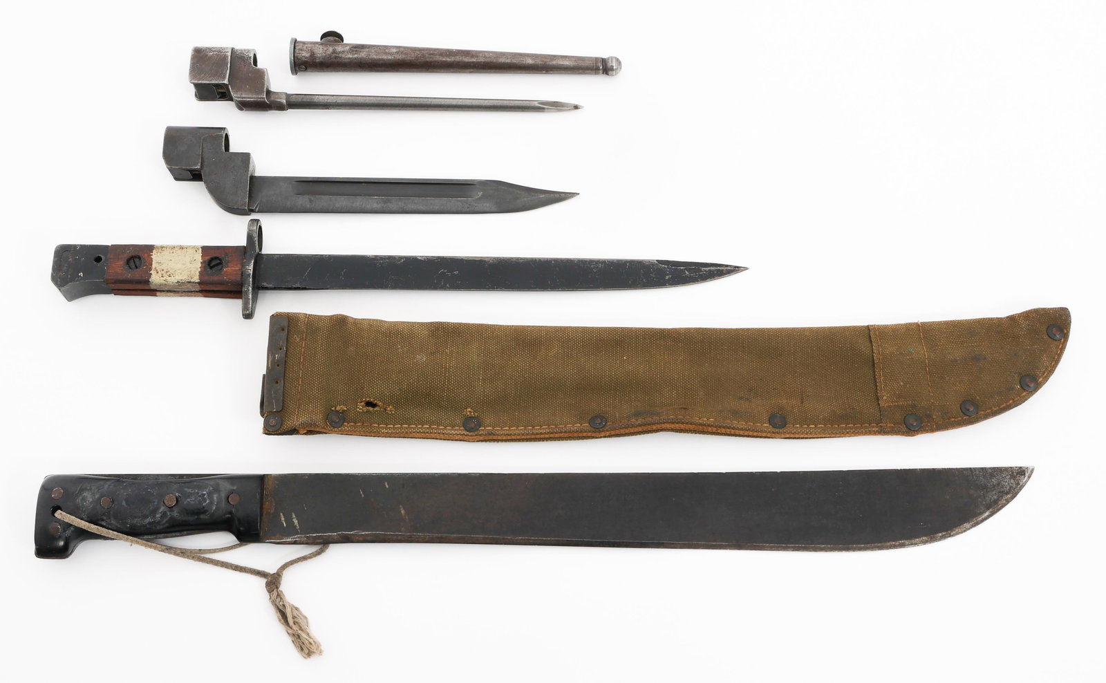 WWII - COLD WAR UK & INDIAN BAYONETS & MACHETE: WWII - COLD WAR UK & INDIAN BAYONETS & MACHETE WWII - Cold War British & Indian Bayonets & Machete. Includes British No. 4 Mk. II socket bayonet with steel scabbard, British No. 9 Socket Bayonet with