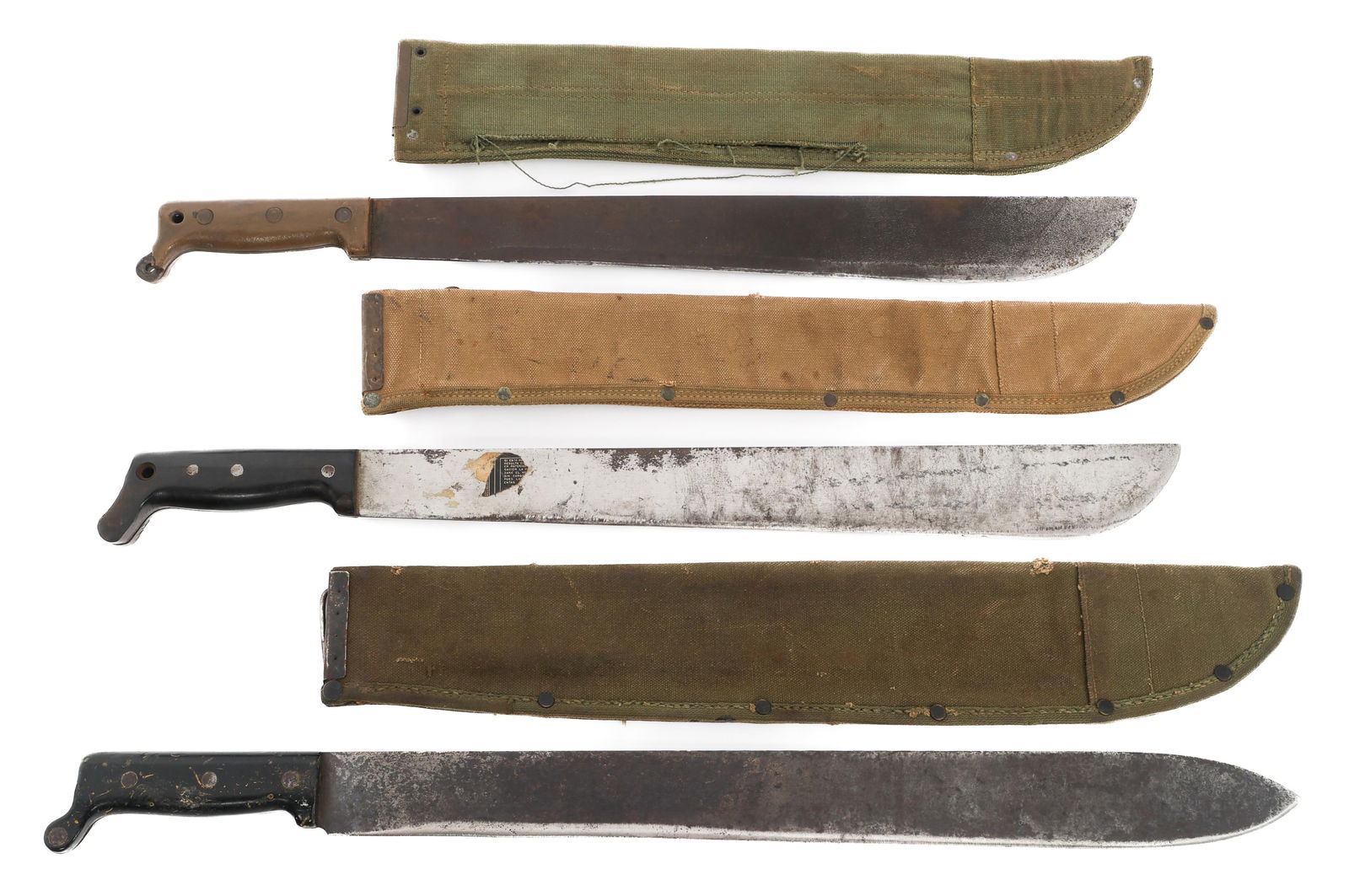 WWII US ARMED FORCES MACHETES: WWII US ARMED FORCES MACHETES WWII US Armed Forces Machetes. (1) Collins & Co M1942. Dated 1942. Composite handle. Canvas scabbard. (1) True Temper M1942. Dated 1945. Canvas scabbard. (1) Briddell No.