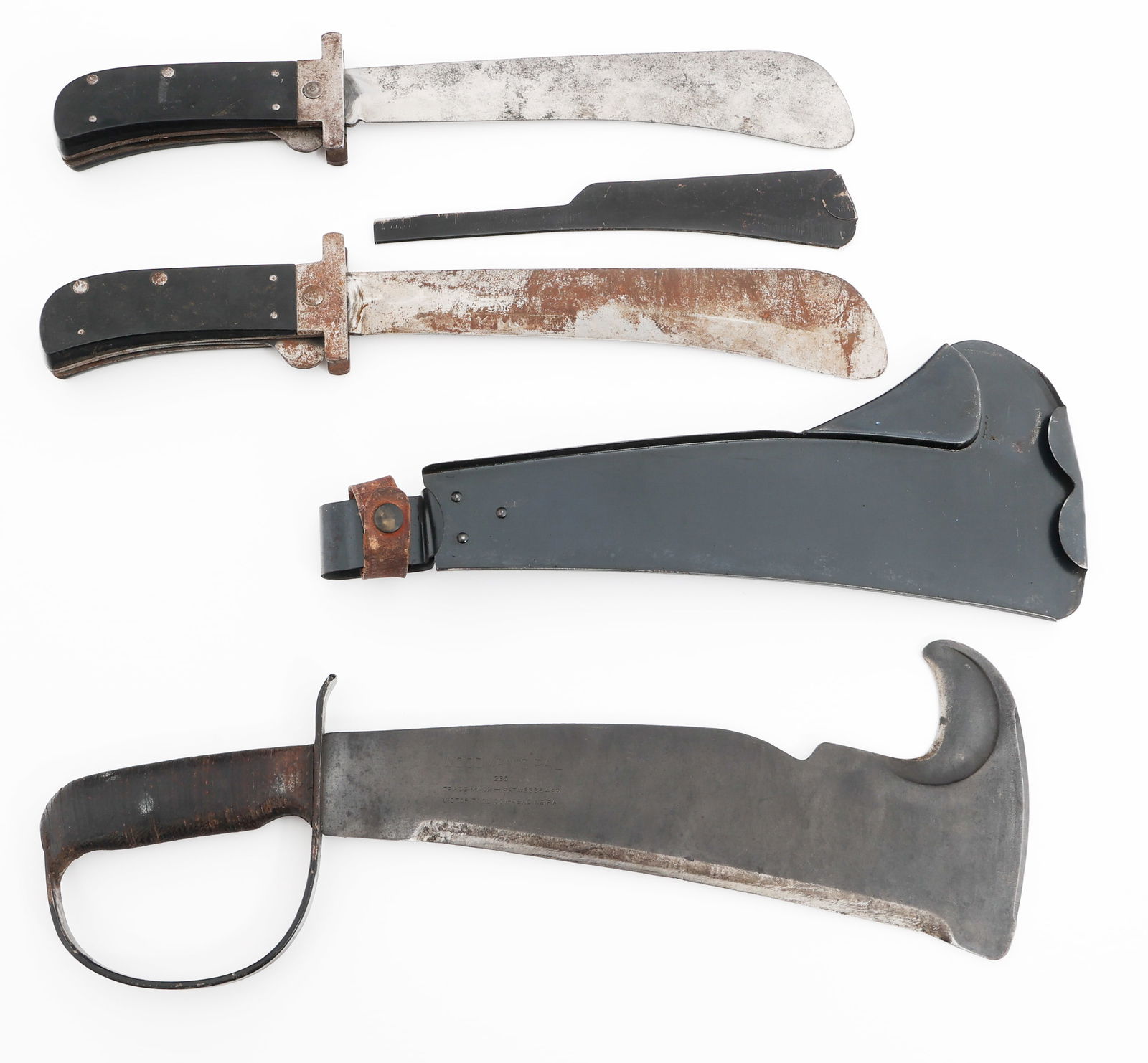 WWII US WOODSMAN'S PAL & AIRMAN SURVIVAL MACHETES: WWII US WOODSMAN'S PAL & AIRMAN SURVIVAL MACHETES WWII US Woodman's Pal and Airman Survival Folding Machetes. (1) Woodman's Pal Machete. Curved, multi-edged blade. Maker mark of "Woodsman's Pal, 280 T