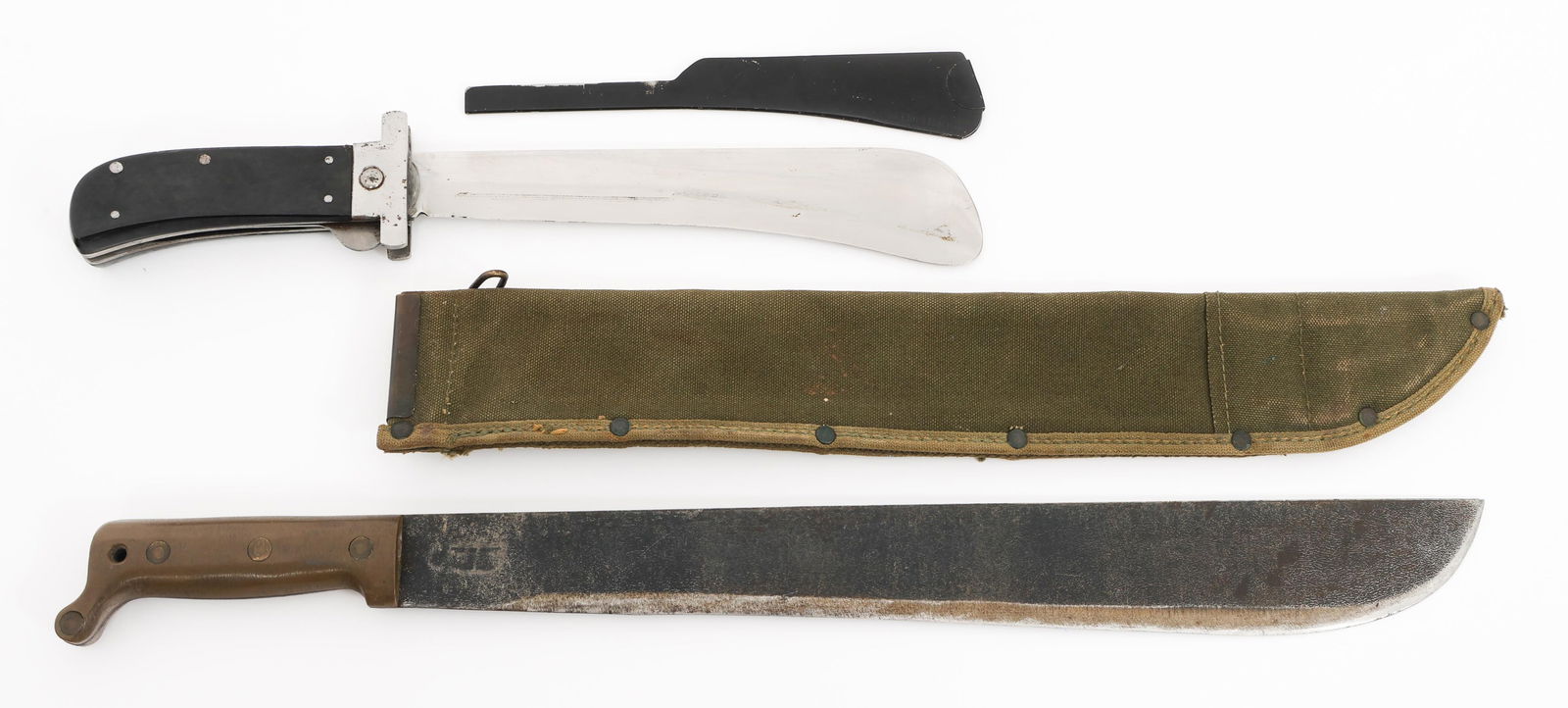 WWII USAAF AIRMAN SURVIVAL & M1942 MACHETES: WWII USAAF AIRMAN SURVIVAL & M1942 MACHETES WWII USAAF Airman Survival and M1942 Machetes. (1) Airman Survival Machete. Single edged, machete blade. Maker marked by Cattaraugus. Blade cover included.