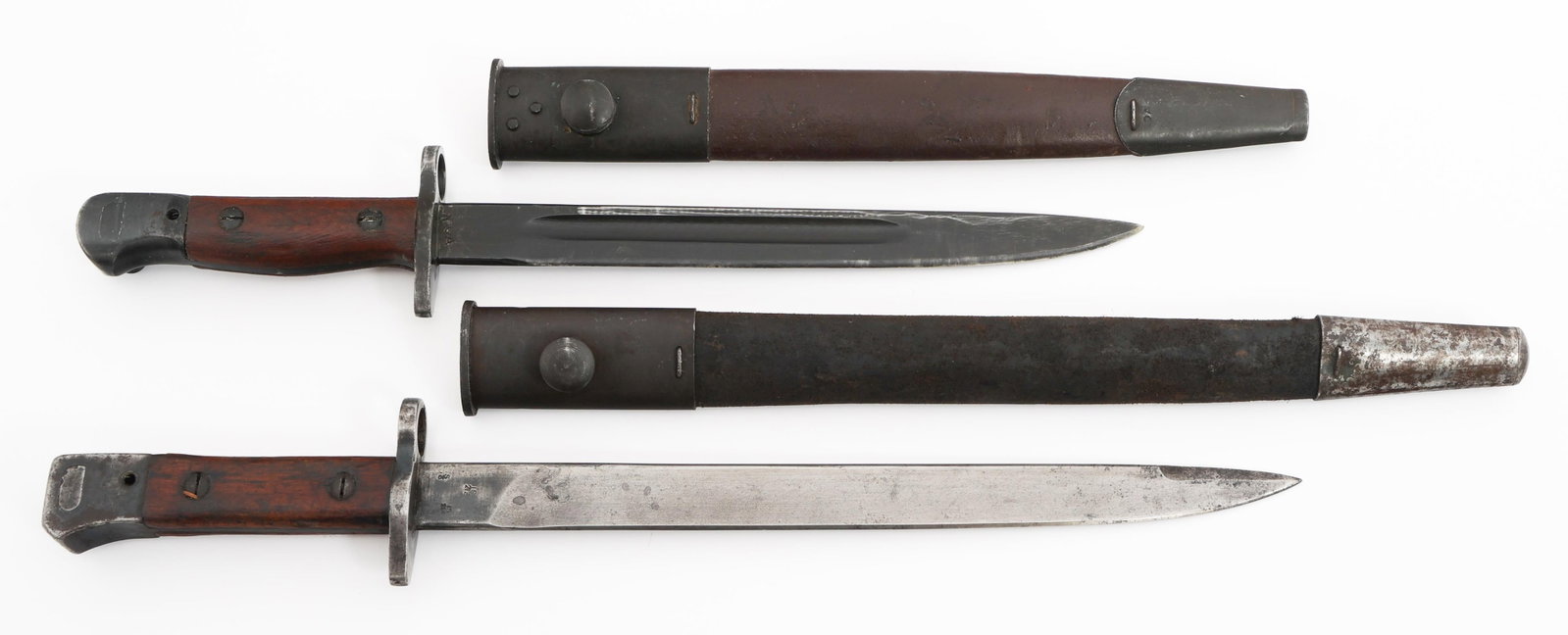 WWII AUSTRALIAN OWEN MkI & BRITISH-INDIAN BAYONETS: WWII AUSTRALIAN OWEN MkI & BRITISH-INDIAN BAYONETS WWII Australian Owen Mk.I & British-Indian No.I Mk.III Bayonets. (1) Owen Mk.I Submachine Gun Bayonet. Single edged, blued blade with fuller. Broad a