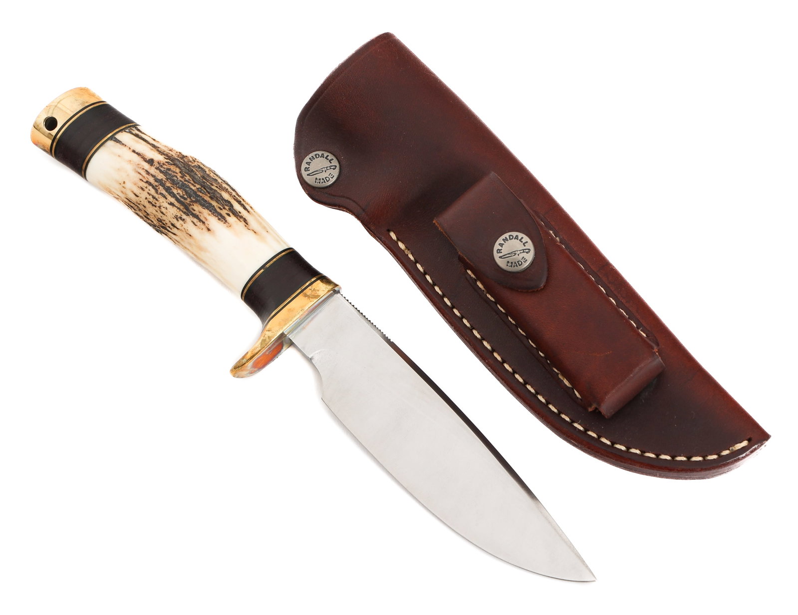 RANDALL MODEL 25 TRAPPER SKINNER KNIFE: RANDALL MODEL 25 TRAPPER SKINNER KNIFE Randall Model 25 Trapper Skinner Knife. Drop point, single edged bright blade. Maker mark of Randall Made Orlando, Fla stamped near the spine. Single brass hilt 
