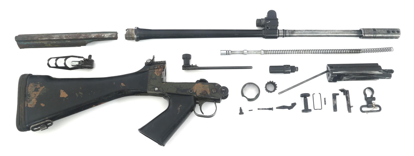 FN MODEL FAL 7.62x51mm MACHINE GUN PARTS KIT: FN MODEL FAL 7.62x51mm MACHINE GUN PARTS KIT FN Model FAL 7.62x51mm machine gun parts kit. Stock with bottom of receiver, pistol grip, and trigger assembly. Barrel with flash hider. Bolt carrier, pist