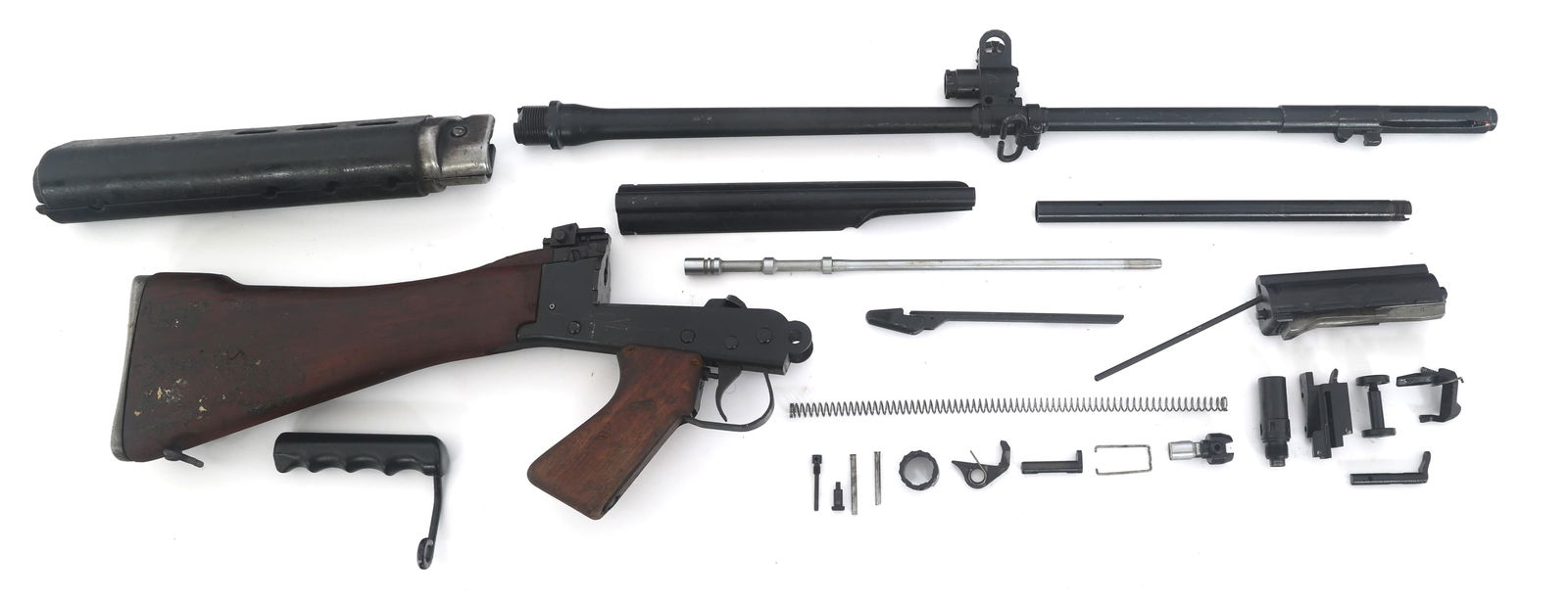 BRITISH L1A1 SLR 7.62x51mm MACHINE GUN PARTS KIT: BRITISH L1A1 SLR 7.62x51mm MACHINE GUN PARTS KIT British Model L1A1 SLR 7.62x51mm caliber machine gun parts kit. Butt stock with lower receiver, trigger group, and pistol grip. Barrel with flash hider