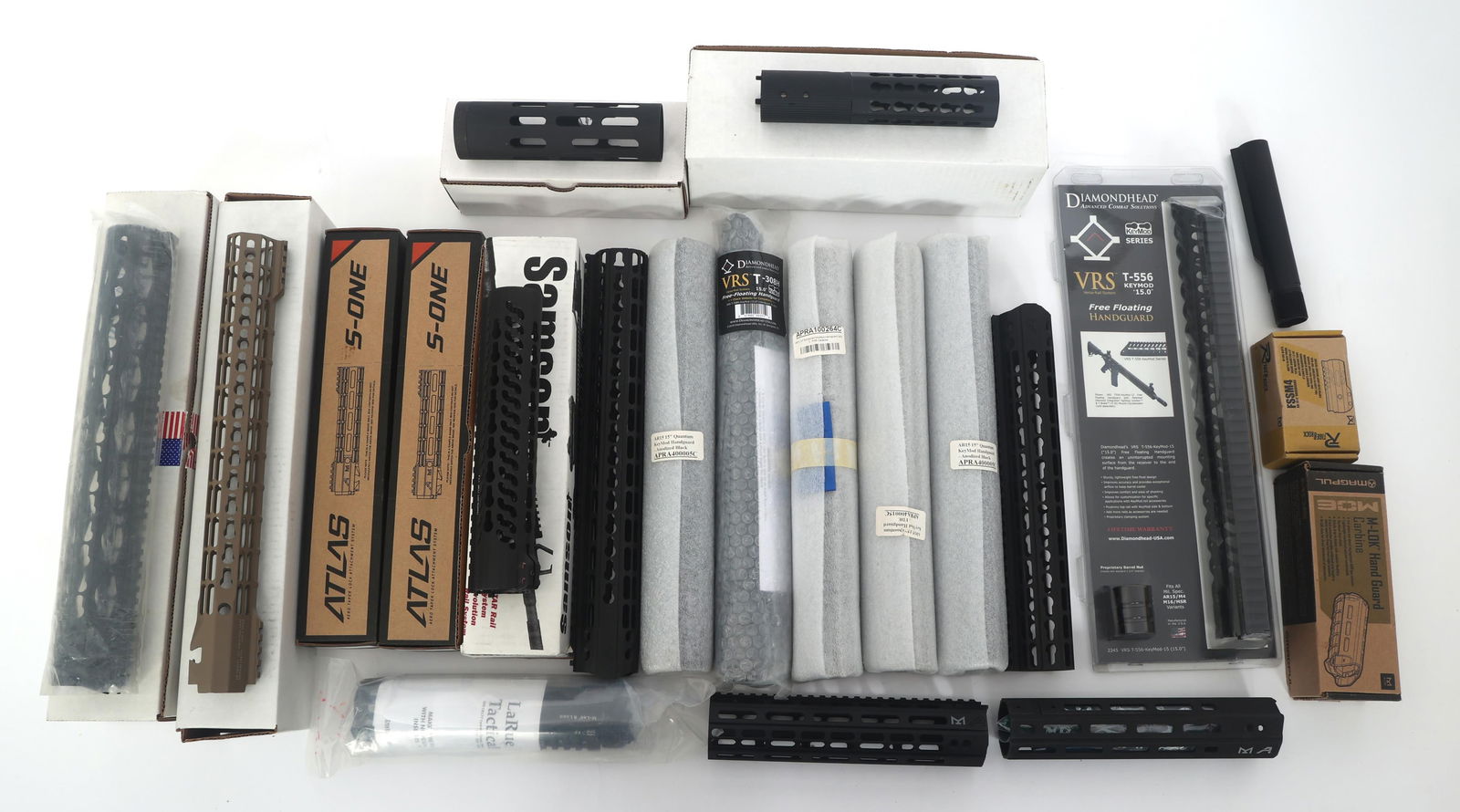 AR-15 RIFLE FREE FLOAT HAND GUARDS: AR-15 RIFLE FREE FLOAT HAND GUARDS Lot of free float hand guards and parts for AR-15 style rifles. Brands include Aero Precision, Diamond Head, and others. Provenance: Lifetime Firearm Collection of G