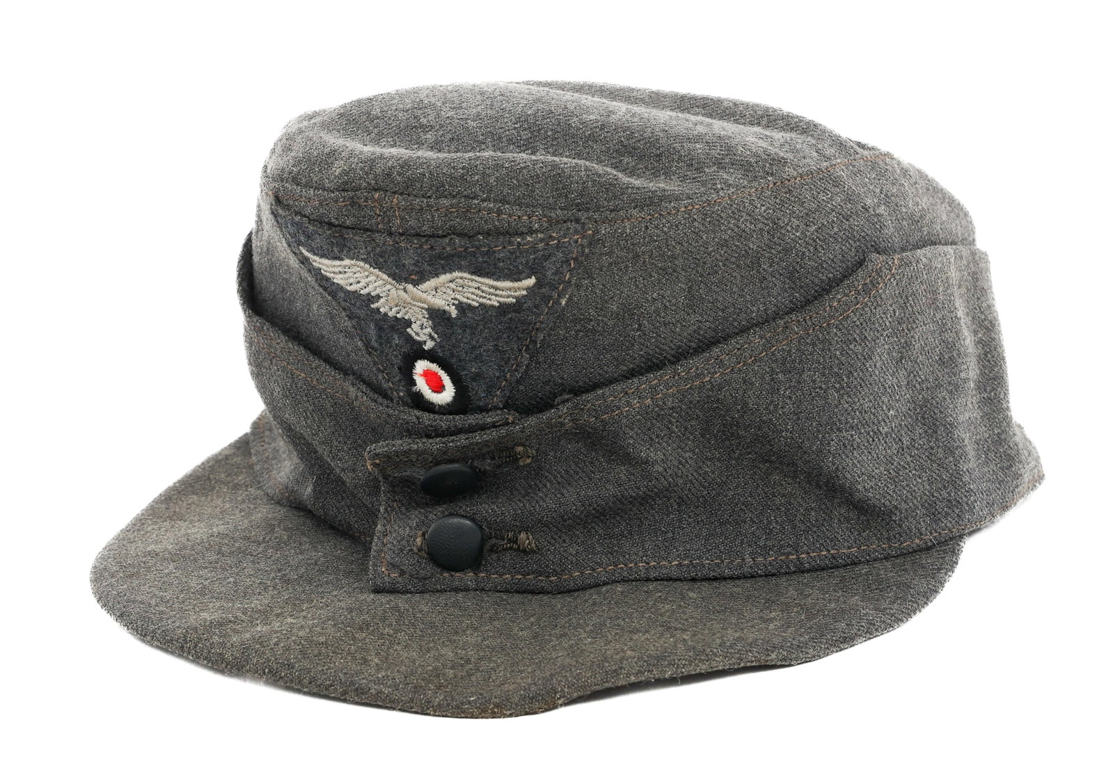 WWII GERMAN LUFTWAFFE M43 EM / NCO FIELD CAP: WWII GERMAN LUFTWAFFE M43 EM / NCO FIELD CAP WWII German Luftwaffe M43 Enlisted Man / NCO Field Cap. Fine blue wool construction with silk liner. Frontal Luftwaffe eagle and cockade stitched insignia.