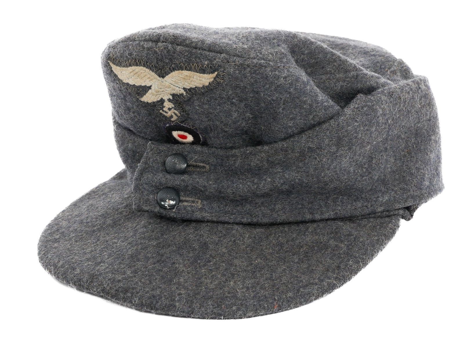 WWII GERMAN LUFTWAFFE M43 EM / NCO FIELD CAP: WWII GERMAN LUFTWAFFE M43 EM / NCO FIELD CAP WWII German Luftwaffe M43 Enlisted Man / NCO Field Cap. Fine blue wool construction with silk liner. Frontal Luftwaffe eagle and cockade stitched insignia.