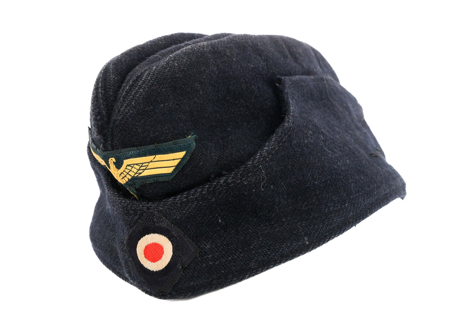 WWII GERMAN KRIEGSMARINE EM/NCO OVERSEAS CAP: WWII GERMAN KRIEGSMARINE EM/NCO OVERSEAS CAP WWII German Kriegsmarine Enlisted/NCO Overseas Cap. Dark blue wool construction with BeVo eagle and cockade patches. No visible marks or stamps on the inte