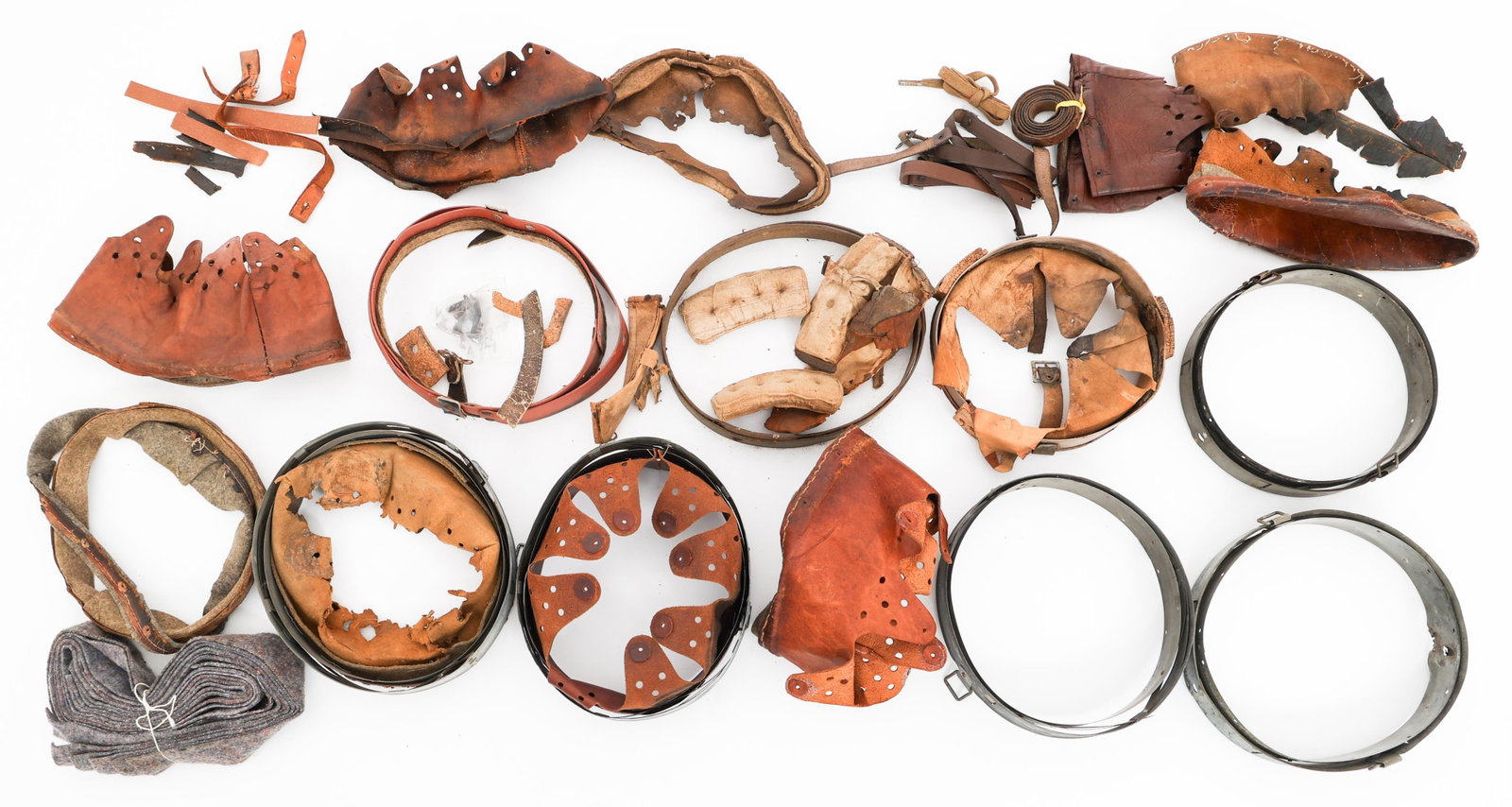 WWII GERMAN HELMET LINER PARTS: WWII GERMAN HELMET LINER PARTS WWII German Helmet Liner Parts. Includes tongued leather liners and metal bands.