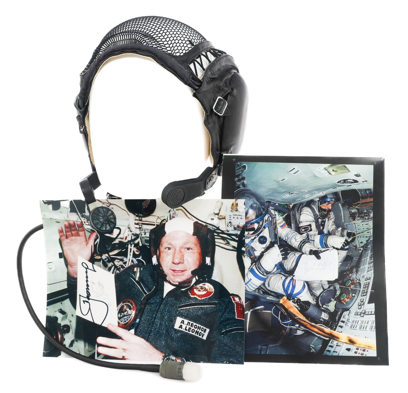 COLD WAR SOVIET COSMONAUT SOKOL-KV-2 HEADSET: COLD WAR SOVIET COSMONAUT SOKOL-KV-2 HEADSET Cold War Soviet Cosmonaut Sokol-KV-2 Headset. Black leather and mesh construction with dual microphones. Includes photograph reprints of two Soviet Cosmona