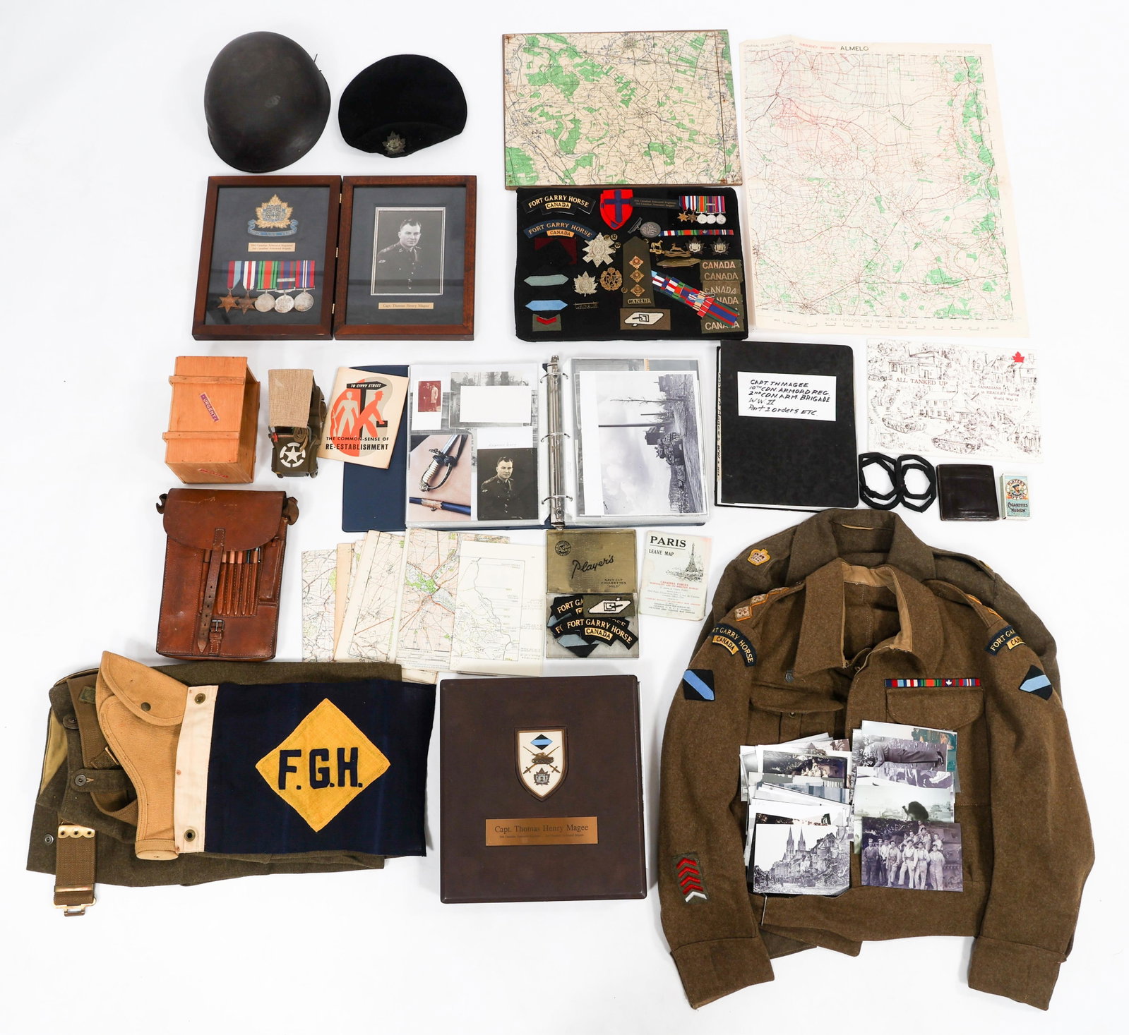 WWII CANADIAN ARMORED CORPS NAMED OFF. GROUPING: WWII CANADIAN ARMORED CORPS NAMED OFF. GROUPING WWII Canadian Armored Corps Named Officer Uniform & Photograph Album Grouping. Named to Captain Thomas Henry Magee of the 10th Canadian Armored Regiment