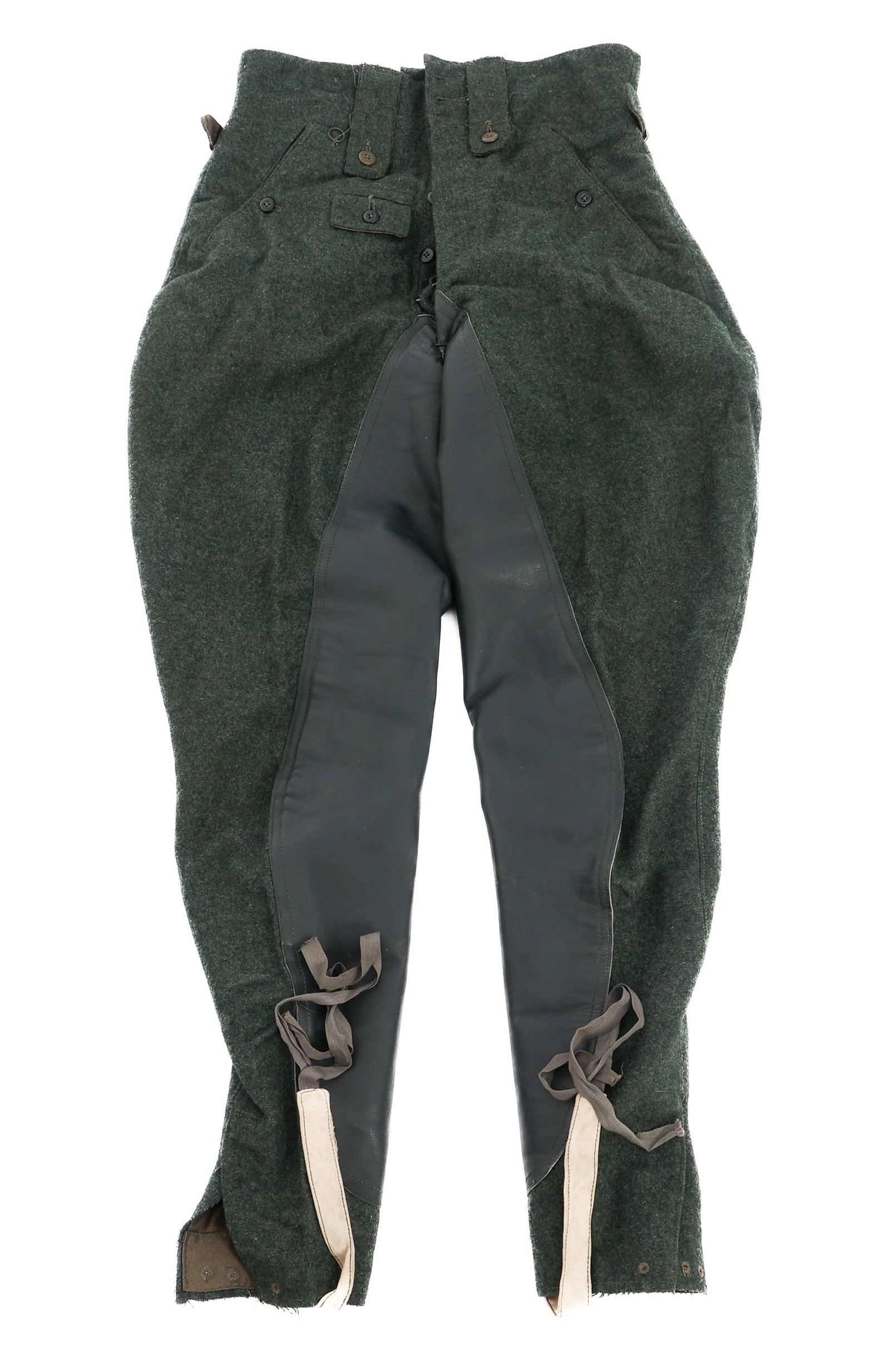 WWII GERMAN HEER M44 CAVALRY RIDING PANTS: WWII GERMAN HEER M44 CAVALRY RIDING PANTS WWII German Heer M44 Cavalry Riding Pants. Wool construction. Modified leather guard. Stamps present. Size: Medium
