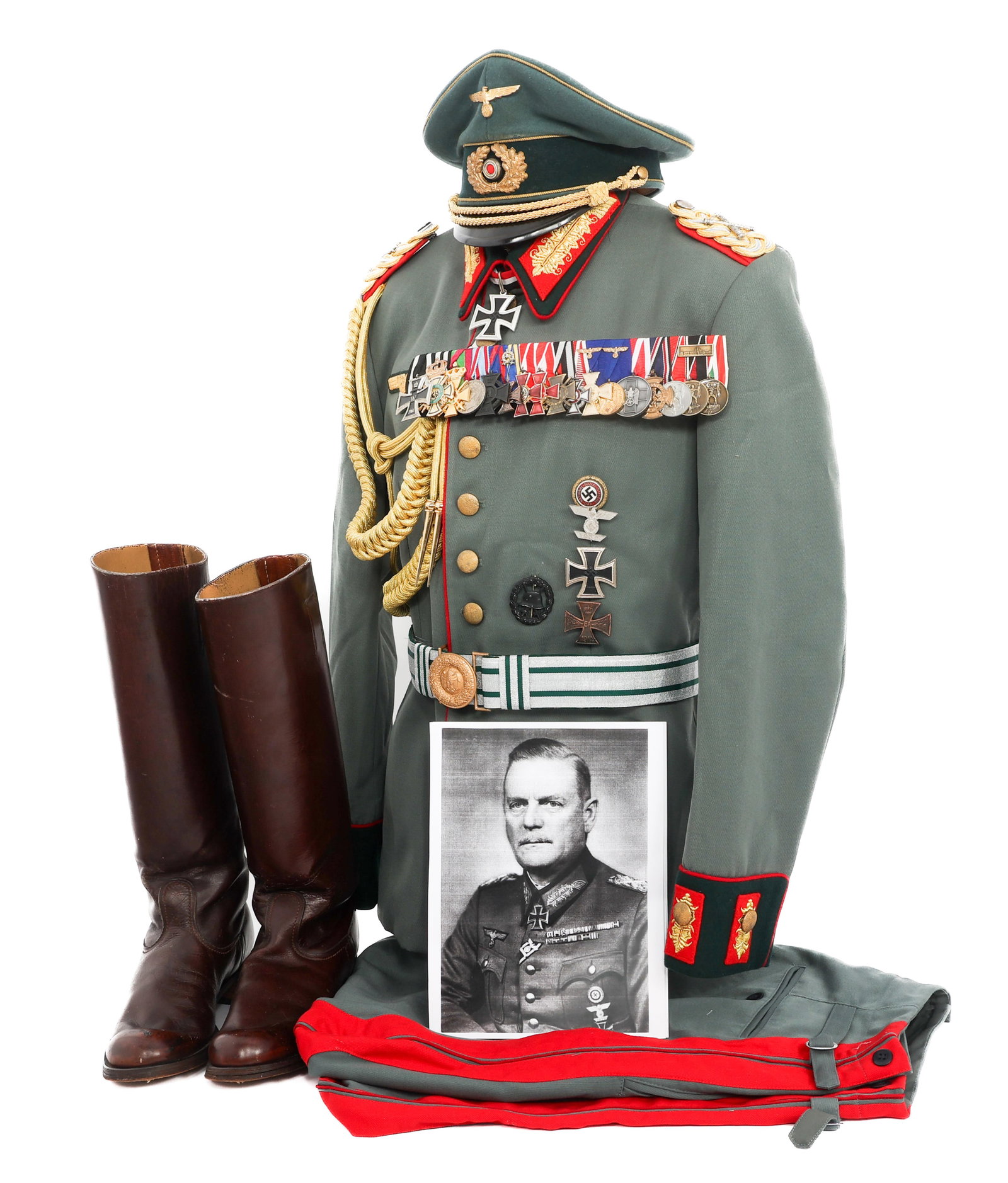 WWII GERMAN WILHELM KEITEL TRIBUTE UNIFORM SET: WWII GERMAN WILHELM KEITEL TRIBUTE UNIFORM SET WWII German Field Marshal Wilhelm Keitel Tribute Uniform Set. Includes tunic, visor cap, trousers, boots, medal bar, and brocade belt. (This grouping is 