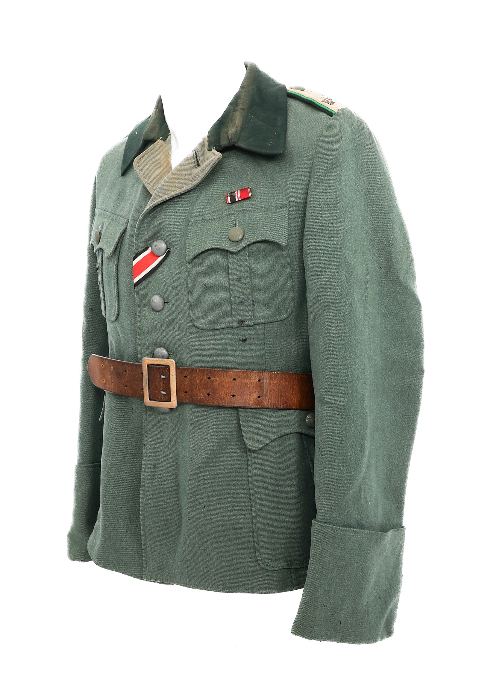 WWII GERMAN PANZER GRENADIER OFFICER M36 TUNIC: WWII GERMAN PANZER GRENADIER OFFICER M36 TUNIC WWII German Heer Panzer Grenadier Officer M36 Service Tunic. Feldgrau wool construction with Panzer Grenadier Hauptmann shoulder boards, iron cross ribbo