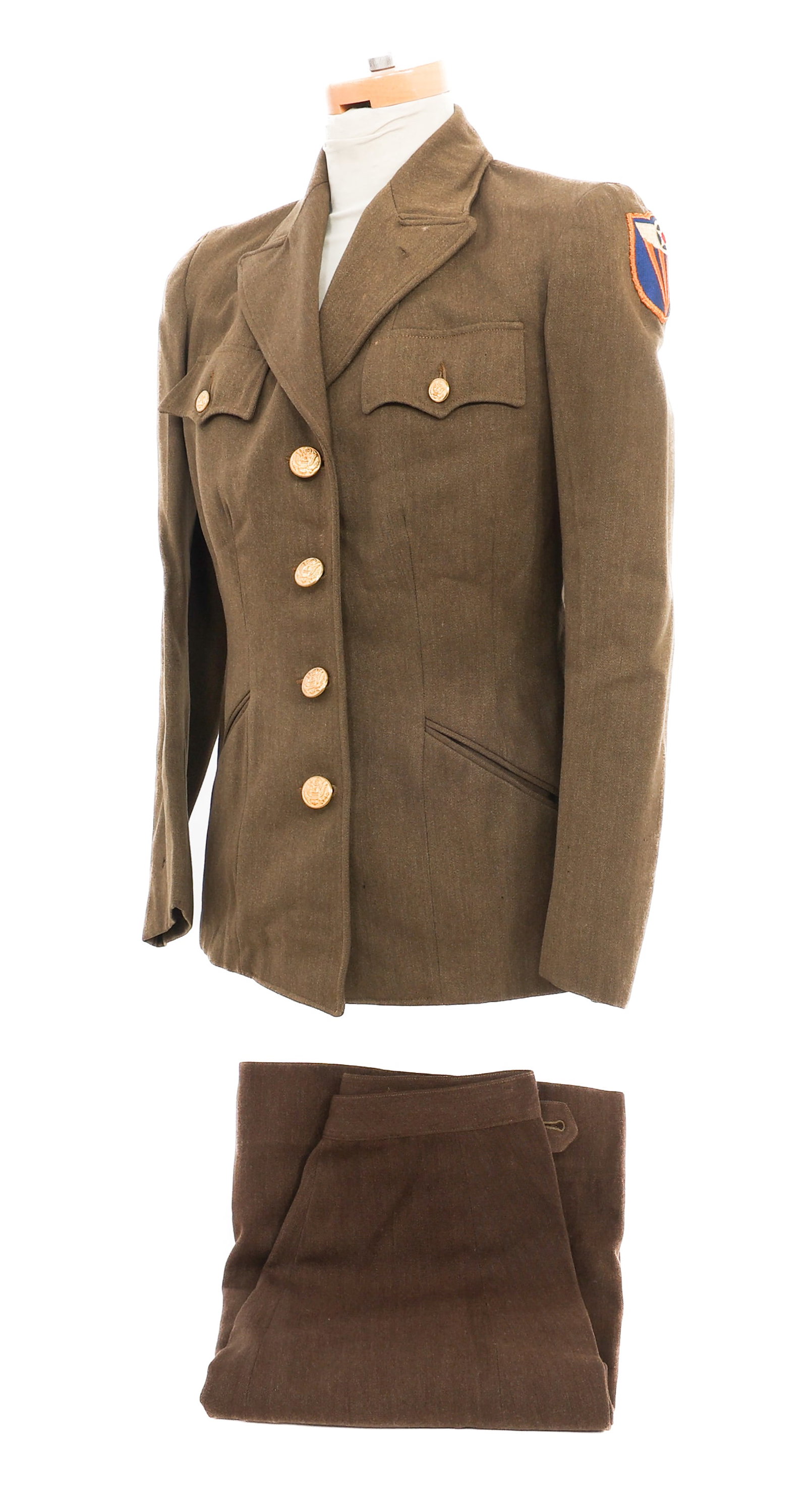 WWII US ARMY WAC 4th AIR FORCE WOMAN'S UNIFORM SET: WWII US ARMY WAC 4th AIR FORCE WOMAN'S UNIFORM SET WWII US Army WAC 4th Air Force Woman's Enlisted Uniform Set. (1) Enlisted Service Tunic with 4th Air Force Patch. Named to Thelma Thornberry A907079 